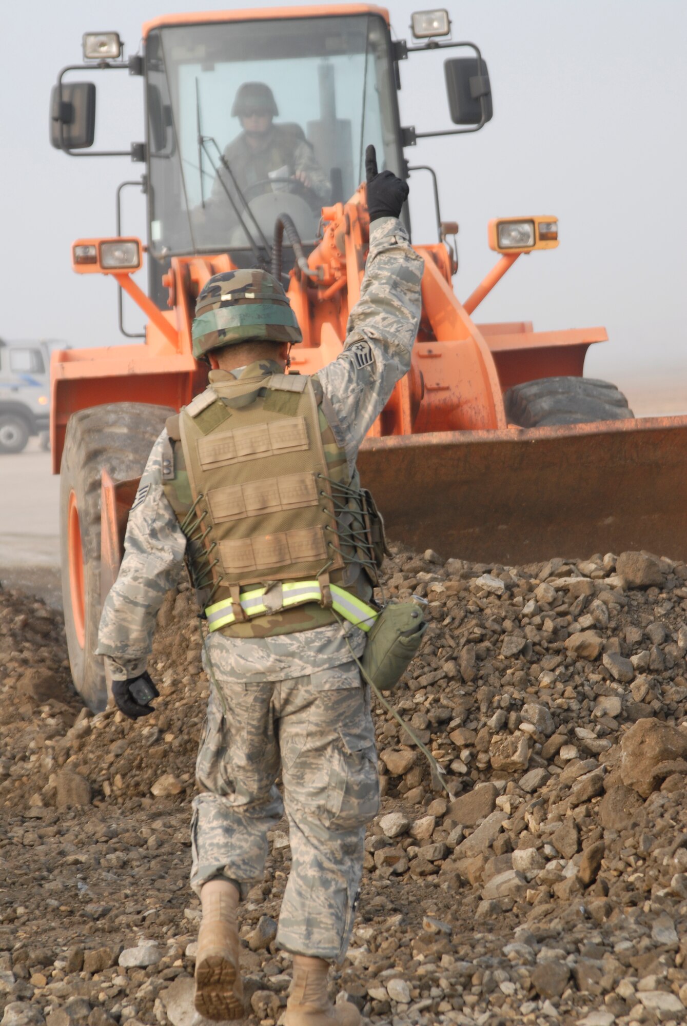 Staff Sgt. Jacob Membreno, 8th Civil Engineer Squadron, acts as Crater Chief during a joint USAF/Republic of Korean Air Forces airfield management training at Kunsan Air Base, Republic of Korea, October 21, 2008. The Crater Chief coordinates all of the assets necessary to complete the job of filling in a crater on the airfield. (U.S. Air Force photo/Staff Sgt. Jason Colbert)