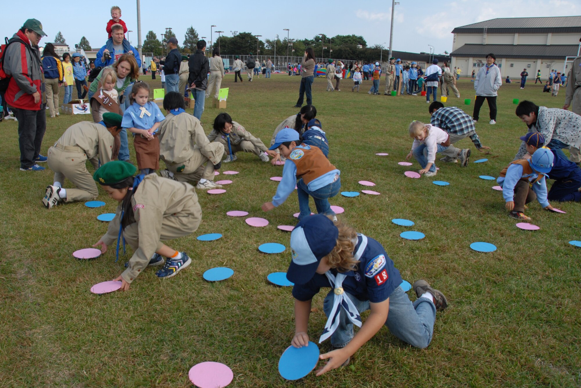MISAWA AIR BASE, Japan -- Japanese and American Boys and Girls Scouts play a game during International Scout Day Oct. 11, 2008. Japanese scouts from Misawa City and the surrounding area attended International Scout Day which promotes and strengthens Japanese and American relations. (U.S. Air Force photo by Senior Airman Laura R. McFarlane)