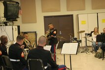 Sgt. Roberto Roman, trumpet player with the Twentynine Palms Brass Quintet, plays his own adaptation of “Amazing Grace” at Waverly High School, Lansing Mich., during the Quintet’s performance at the high school October 23. The Quintet went on a five-day tour of Recruiting Station Lansing October 20 24, performing for the public and offering clinics for the students.
