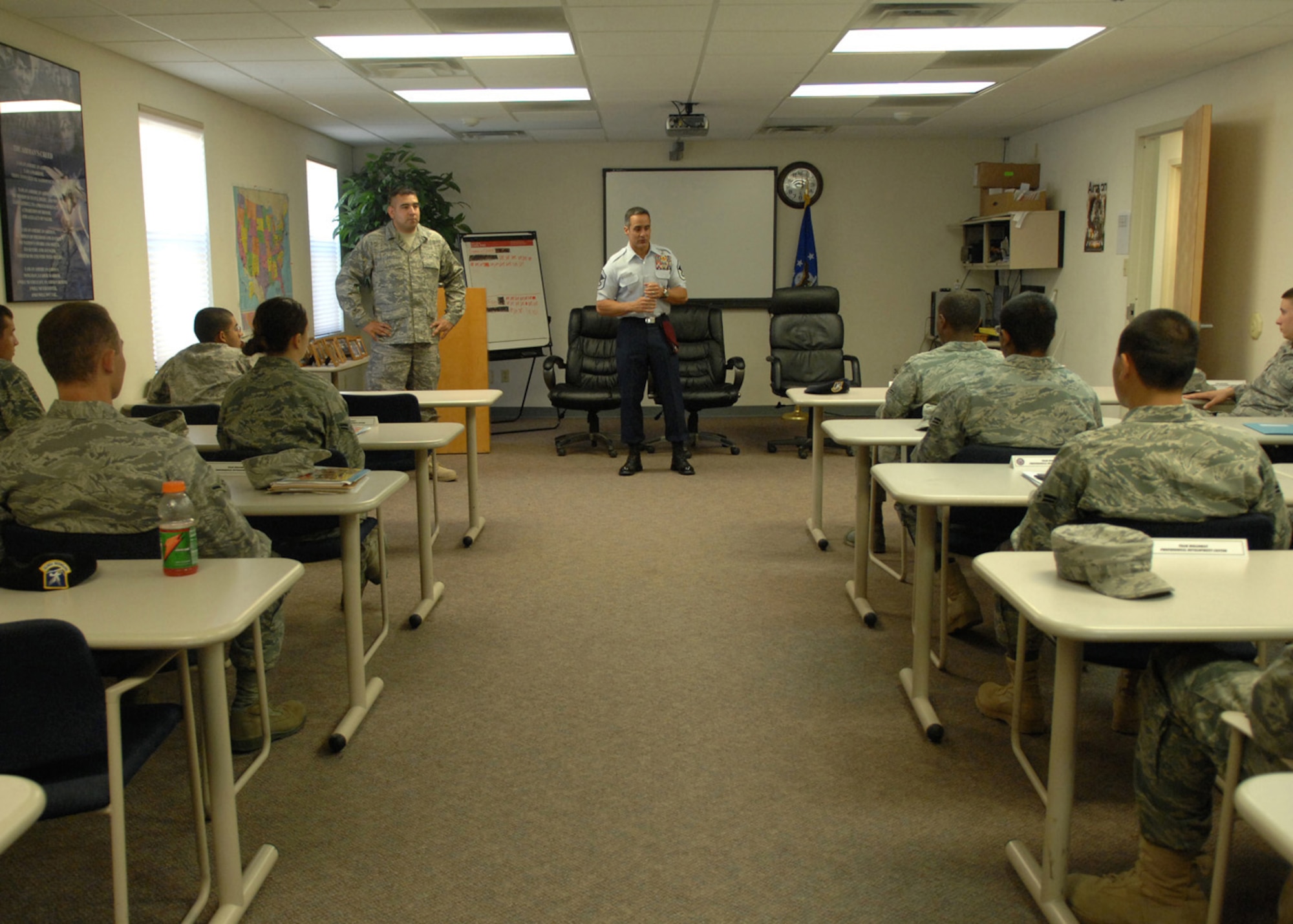 Senior Master Sgt. Raymon Colon-Lopez, commandant for the Air Force Pararescue in Combat Rescue Officer School speaks with students from Holloman's First Term Airmen Course in the Career Development Center, at Holloman Air Force Base, N.M., October 17. Sergeant Colon-Lopez tells the Airmen about his experiences in the pararescue career field. (U.S. Air Force photo/Airman 1st Class Veronica Salgado)