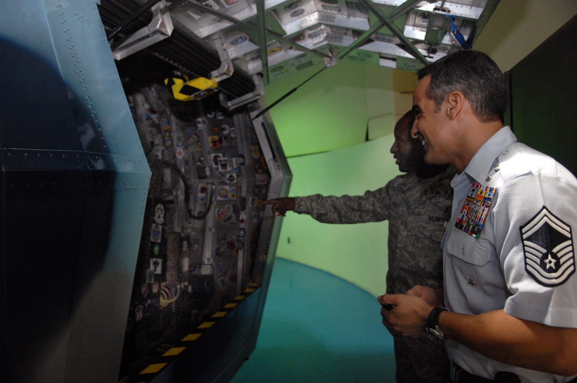 Senior Master Sgt. Raymon Colon-Lopez, commandant for the Air Force Pararescue in Combat Rescue Officer School, takes a look at the centrifuge located in the Physiological Training Center October 17. As a distinguished visitor, Sergeant Colon-Lopez takes a tour of Holloman Air Force Base, N.M. (U.S. Air Force photo/Airman 1st Class Veronica Salgado)