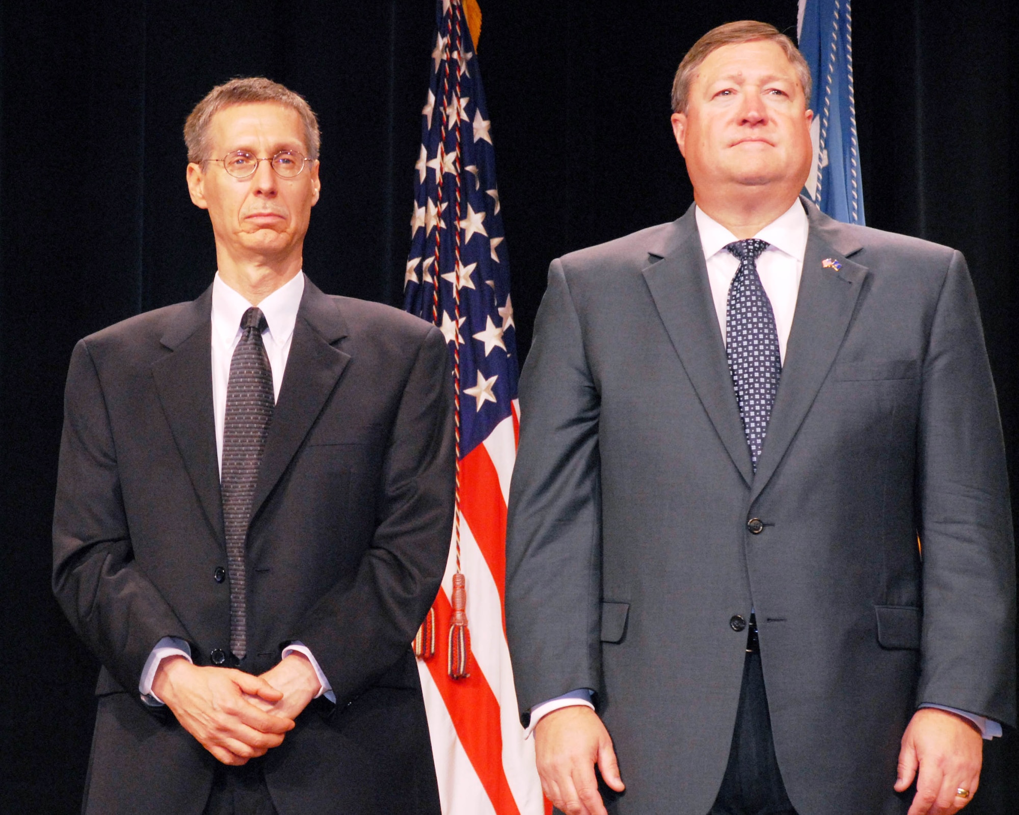Secretary of the Air Force Michael B. Donley (right) joins Edmund G. Zelnio prior to his receiving the Department of Defense Medal for Distinguished Civilian Service from Secretary of Defense Dr. Robert M. Gates. The ceremony took place Oct. 21 in the Pentagon. Mr. Zelnio is a senior electrical engineer at the Air Force Research Laboratory at Wright-Patterson Air Force Base, Ohio. (U.S. Air Force photo/Master Sgt. Russell P. Petcoff) 