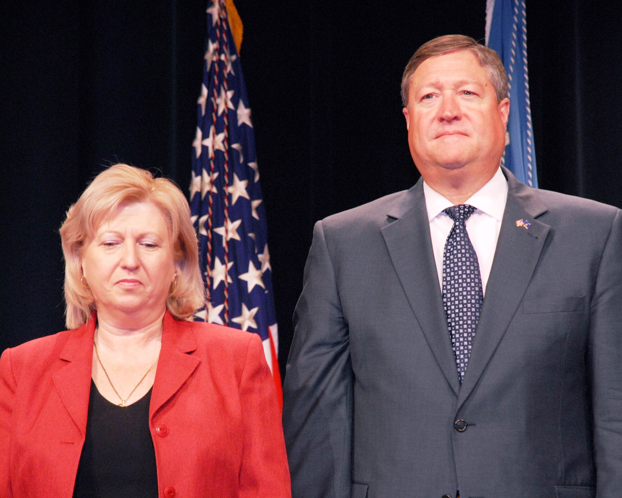Secretary of the Air Force Michael B. Donley joins Umit A. Spencer prior to her receiving the DOD David O. Cooke Excellence in Public Administration Medallion from Secretary of Defense Dr. Robert M. Gates. The ceremony took place Oct. 21 in the Pentagon. Ms. Spencer is the housing maintenance contract monitor for the 354th Civil Engineer Squadron at Eielson Air Force Base, Alaska. (U.S. Air Force photo/Master Sgt. Russell P. Petcoff) 