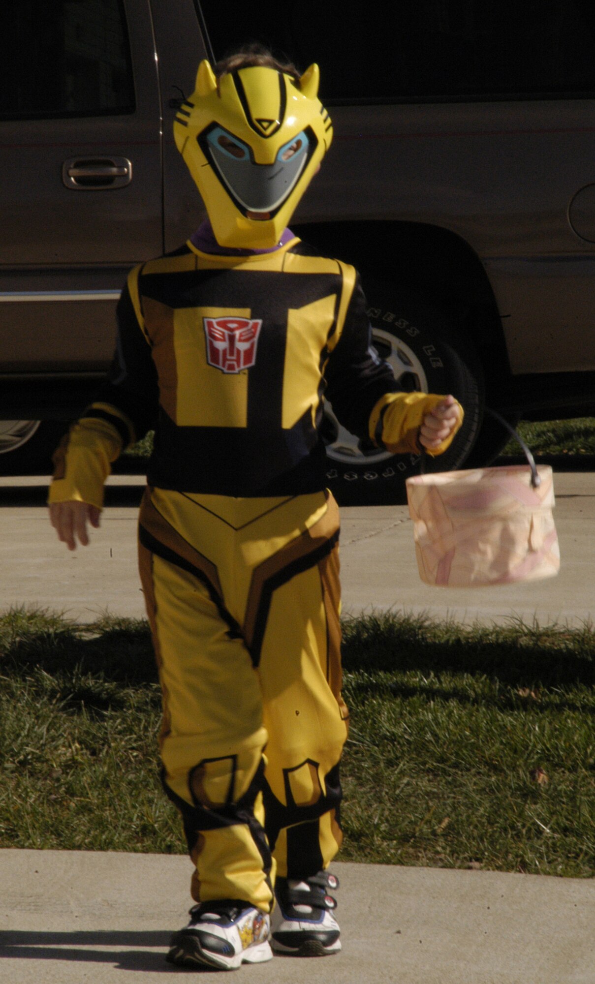 Costumes should be made of fire-resistant material and large enough to allow clothes to be worn underneath to protect children from the cold.  Children should wear bright colors, reflective tapes and carry flashlights. (U.S. Air Force Photo/Staff Sgt. Chad Padgett)                           