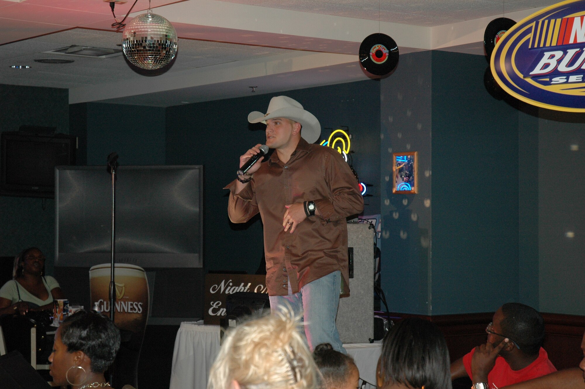 SCOTT AIR FORCE BASE, Ill. -- Staff Sgt. Tim Herrman performs during the Scott Icon competition in August. He was the base level winner and is representing Scott at the Air Mobility Command Icon command performance tonight at the Scott Club.  Sergeant Herrman is up against contestants from 10 other AMC bases across the country.
(courtesy photo)