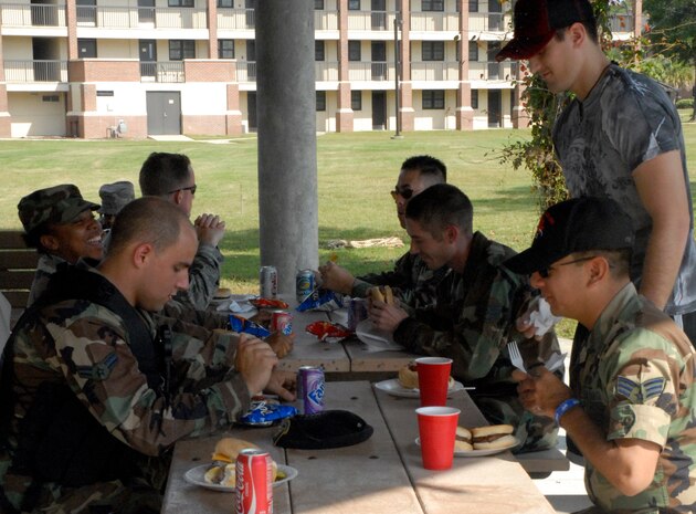 Airmen from Charleston AFB take time of their day to participate in the Oktoberfest held on Charleston AFB Oct. 17. The Charleston AFB Top 3 provided food, drinks and entertainment for junior-enlisted Airmen during the annual event.  (U.S. Air Force photo/Staff Sgt. Jennifer Arredondo)