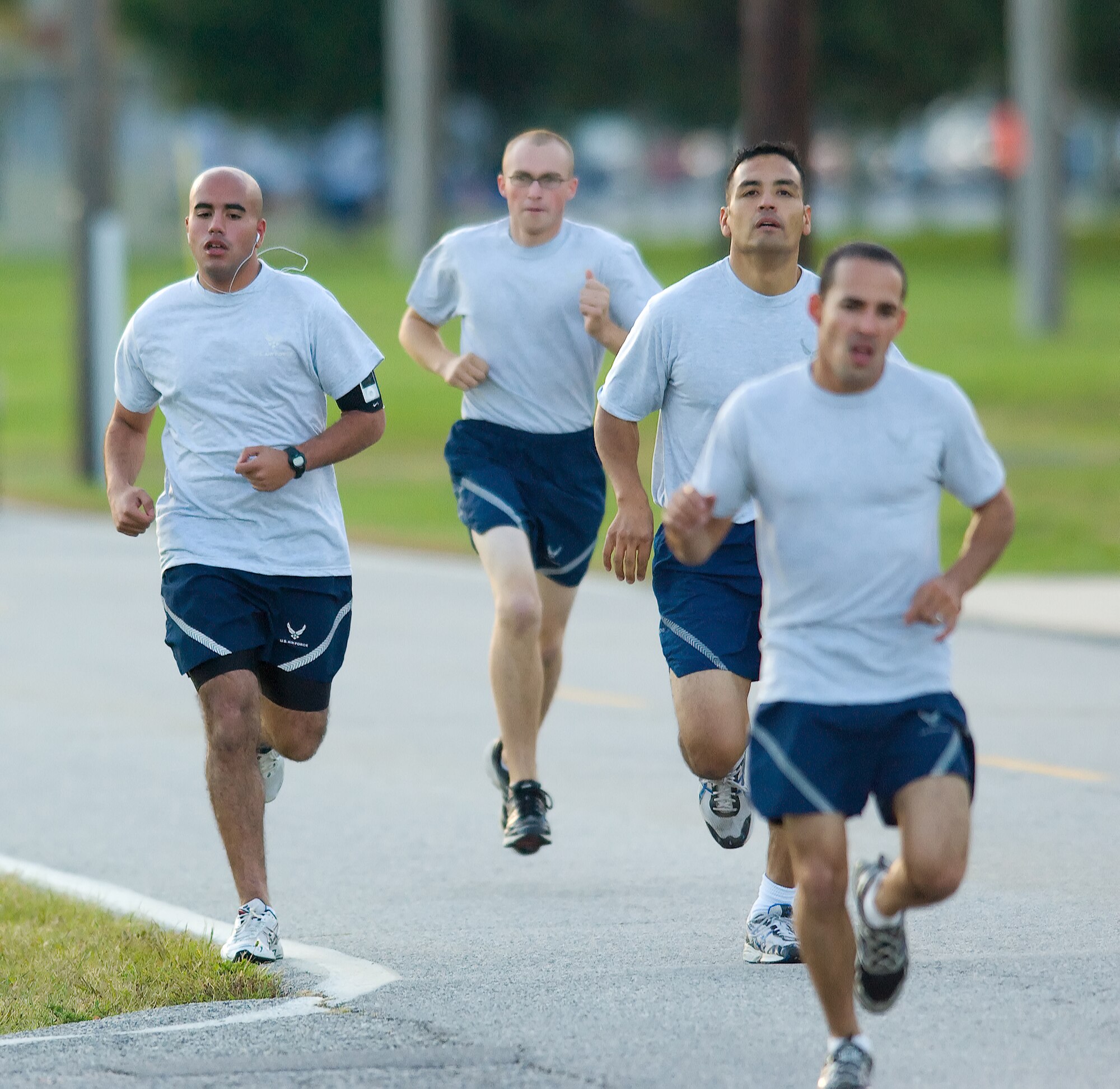 Team Dover members run on base in the Warrior Run during Wing Sports Day Oct. 17.  Nearly 700 Dover Airmen participated in the warrior run, the kickoff event to Wing Sports Day.  (U.S. Air Force Photo/Jason Minto)