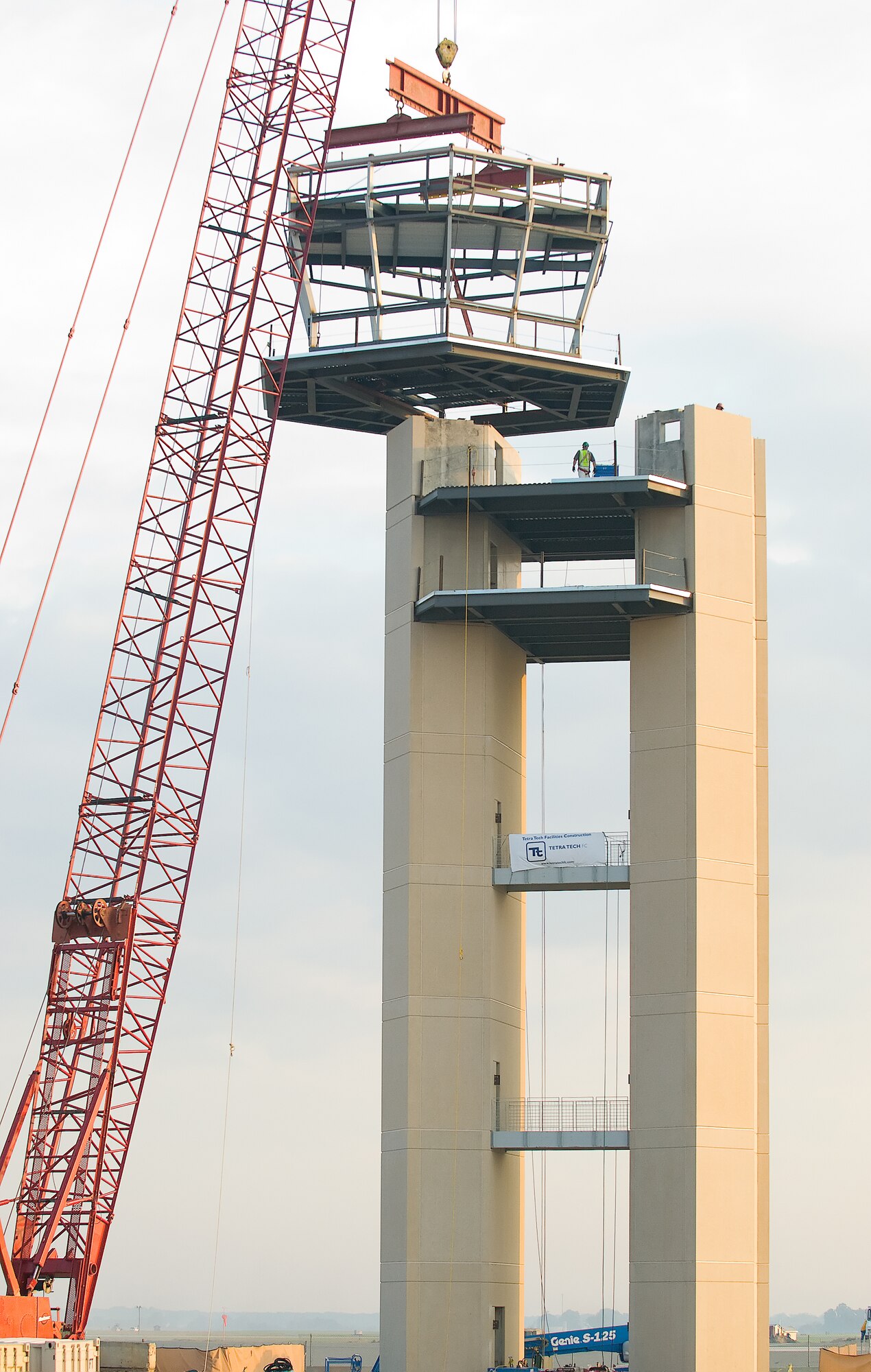 Contractors lower the cab into place for Dover's new Air Traffic Control Tower Oc.t 15.  The new tower is scheduled to be completed in April 2009.  (U.S. Air Force photo/Roland Balik)