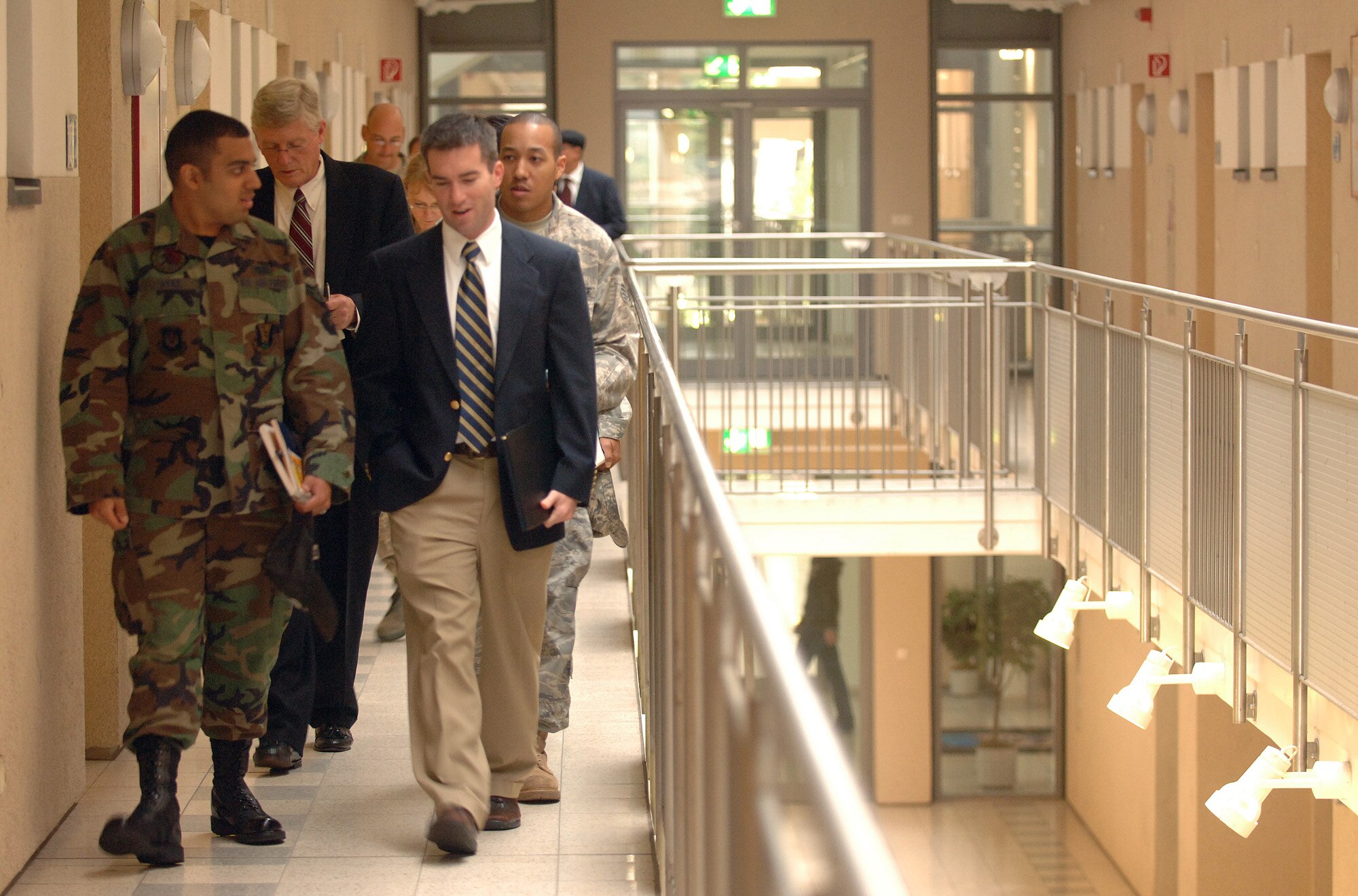House Appropriations Committee staff delegates, Keith Baker and Adam Johnson receive a tour of Ramstein Air Base's newest dormitory. The visit was part of a DOD-wide investigation to assess the quality of unaccompanied housing offered to single service members. (DOD photo/ Master Sgt. Scott Wagers)