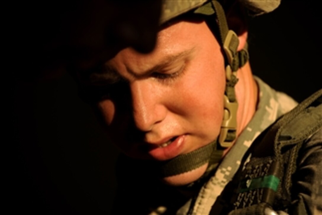 U.S. Army 1st Lt. Matt Geib checks his gear prior to boarding an aircraft during a joint forcible entry exercise at Pope Air Force Base, N.C., on Oct. 21, 2008.  The forcible entry exercise provides U.S. Army soldiers assigned to the 82nd Airborne Division with training on real-world contingency operations.  