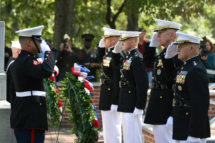 Pictured from right to left: Lt. Gen. Dennis J. Hejlik, II Marine Expeditionary Force Commanding General; Gen. James T. Conway, Commandant of the Marine Corps; Col. John K. Love, Commanding Officer 8th Marine Regiment, 2nd Marine Division; Col. Richard P. Flatau Jr., Commanding Officer Marine Corps Base Camp Lejeune. Generals and Officers salute the memorial wreaths during a twenty-one gun salute to honor the fallen heroes of the Beirut Bombing.