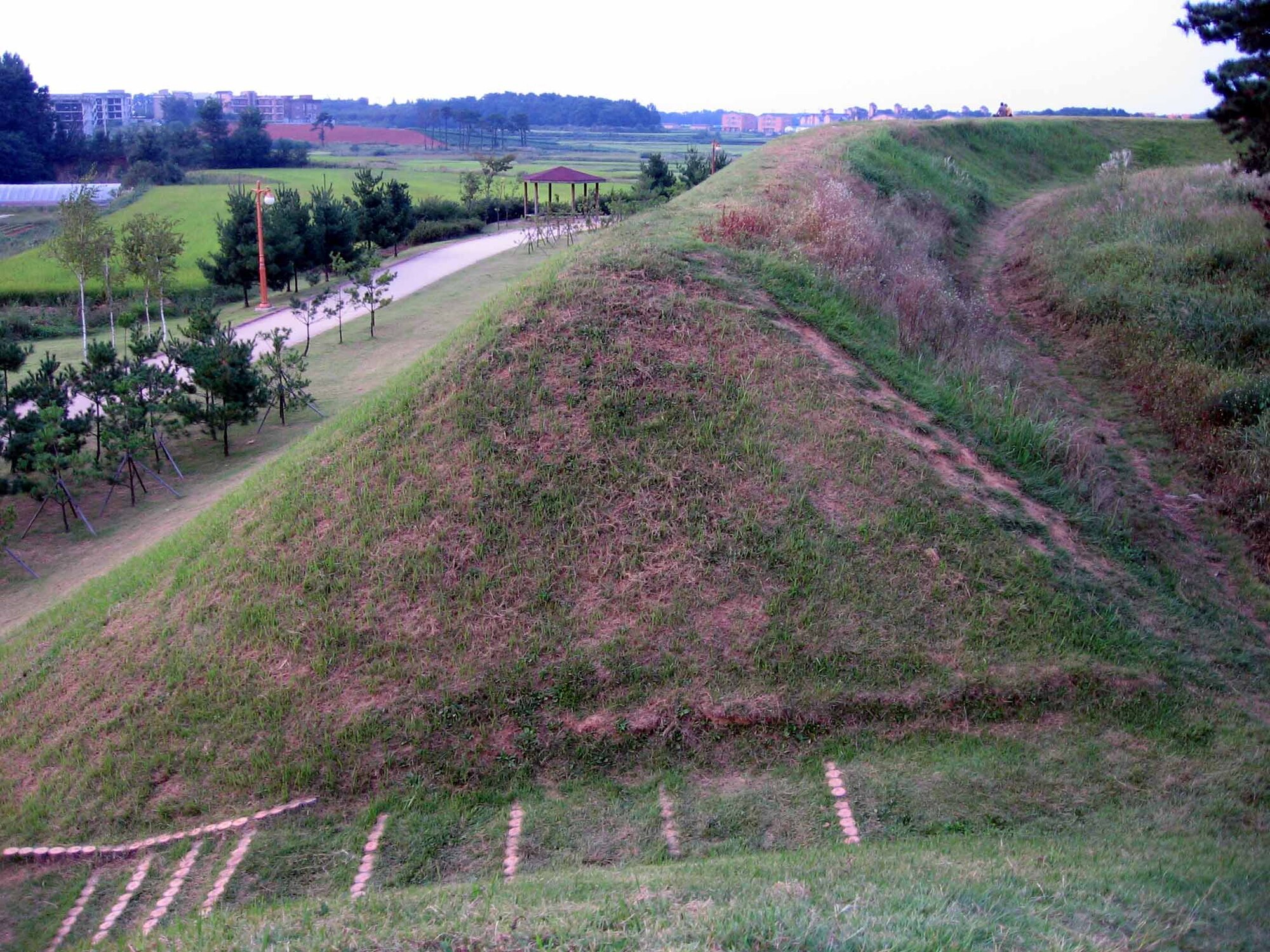 An earthen-wall fortress, located just blocks away from the main entrance to U.S. Army Garrison Humphreys in Pyeongtaek, is believe to been built by Pal Geup Lim to protect his family from outside threats during the Goryeo Kingdom period, 918 to 1392 A.D. (U.S. Air Force photo/Master Sgt. Matt Summers)