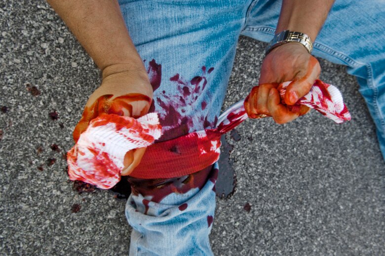 Coyotes and Cockpits - "I can't remember how (the gun) got off safety, but it shot right through the lower femur above the knee" the major said. "We found out later that much of my femur was gone." (photo by Tech. Sgt. Matthew Hannen)