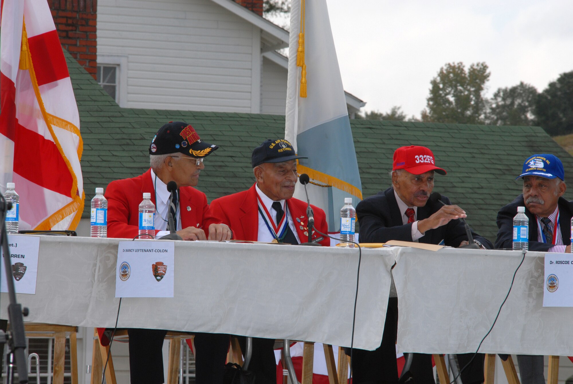 Tuskegee Airmen participate in a panel discussion prior to the opening ceremony of the Tuskegee Airmen National Historic Site Oct. 10 at Moton Field, Tuskegee, Ala. (U.S. Air Force Photo by Lt. Col. Jerry Lobb)         