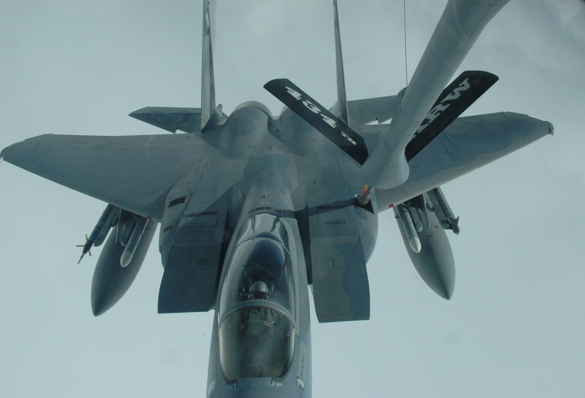 An F-15 from the 33d Fighter Wing, Eglin Air Force Base, Fla. is refueled in mid-air by a KC-135 tanker and crew from the 74th Air Refueling Squadron at Grissom Air Reserve Base, Ind., Oct. 23. The unit's four-day temporary duty gave fighter pilots and tanker aircrew the opportunity to keep current on their flying training with this business effort, said Maj. Kelly Ammon, KC-135 pilot. (U.S. Air Force photo/Chrissy Cuttita)