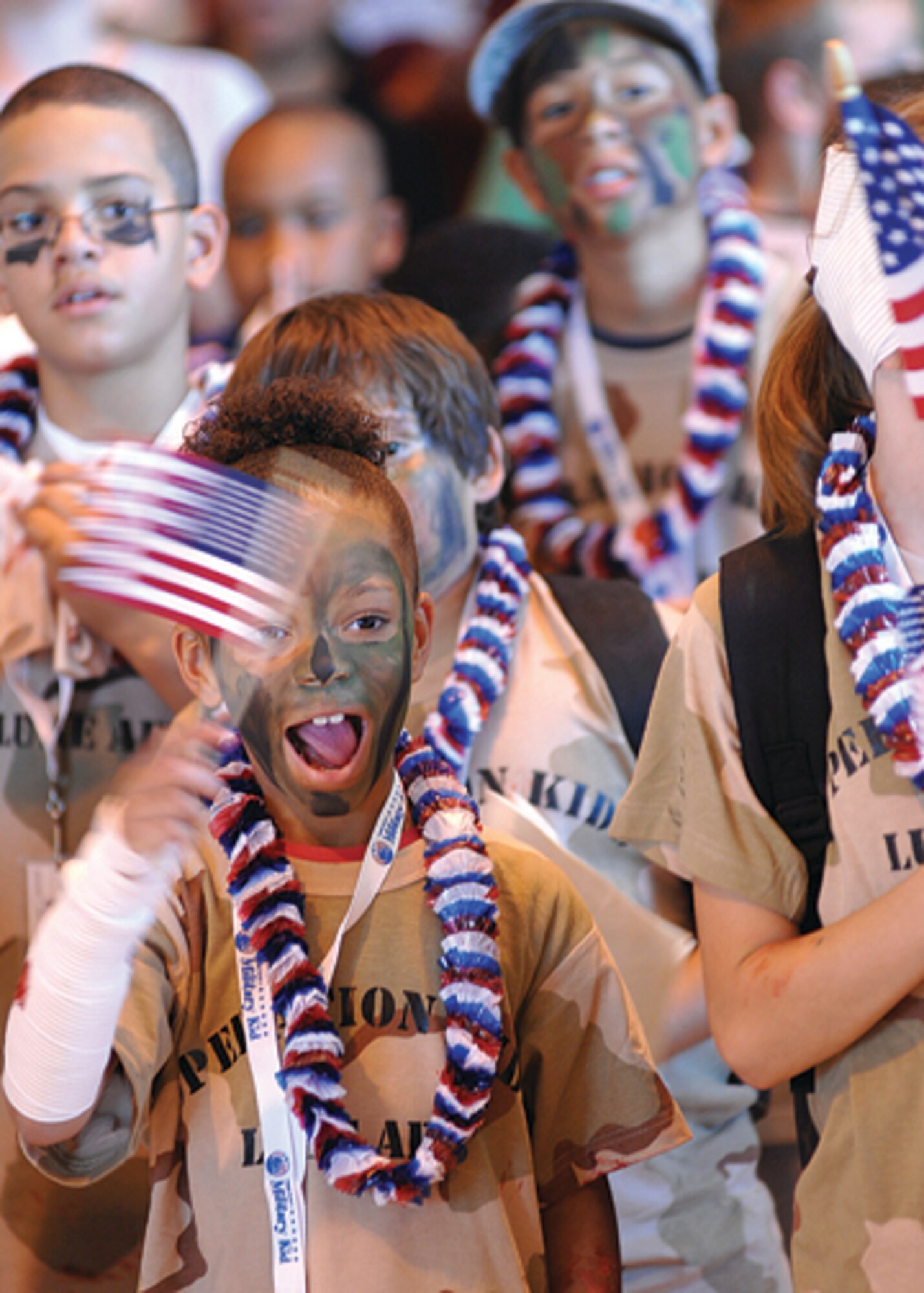 Participants in Operation KIDS celebrate after "returing home" at the completion of their mission. (U.S. Air Force Photo/Tech. Sgt. Jeffery Wolfe.)