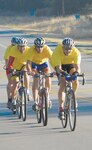 Dan Joder, George Heagerty, Kevin Barton and Tom Bain, the "Geri Atrix" relay team, compete in the cycling portion of the Rambler 120. Geri Atrix finished with the silver medal in the All-male Relay division. Participants from four U.S. Air Force Bases competed in the triathlon held each year at Canyon Lake. (U.S. Air Force photo by Steve White)