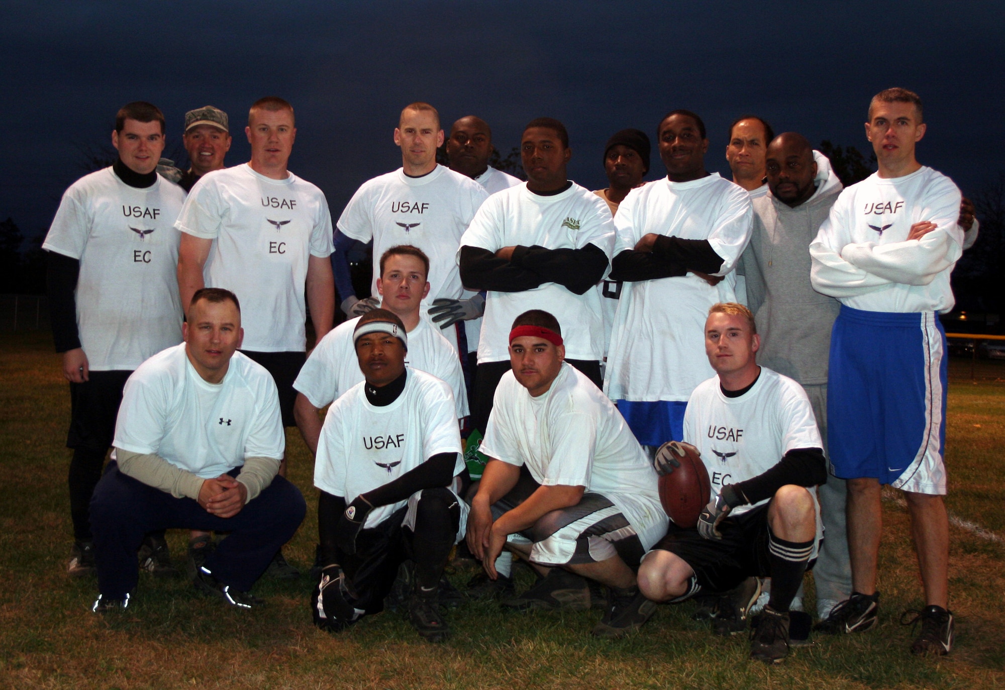 Team members from the U.S. Air Force Expeditionary Center's "Screaming Eagles" intramural flag football team line up for a team photo Oct. 22, 2008, on McGuire Air Force Base, N.J.  The USAF EC had just defeated McGuire Services 12-6 to improve to 9-3 on the season.  (U.S. Air Force Photo/Tech. Sgt. Scott T. Sturkol)