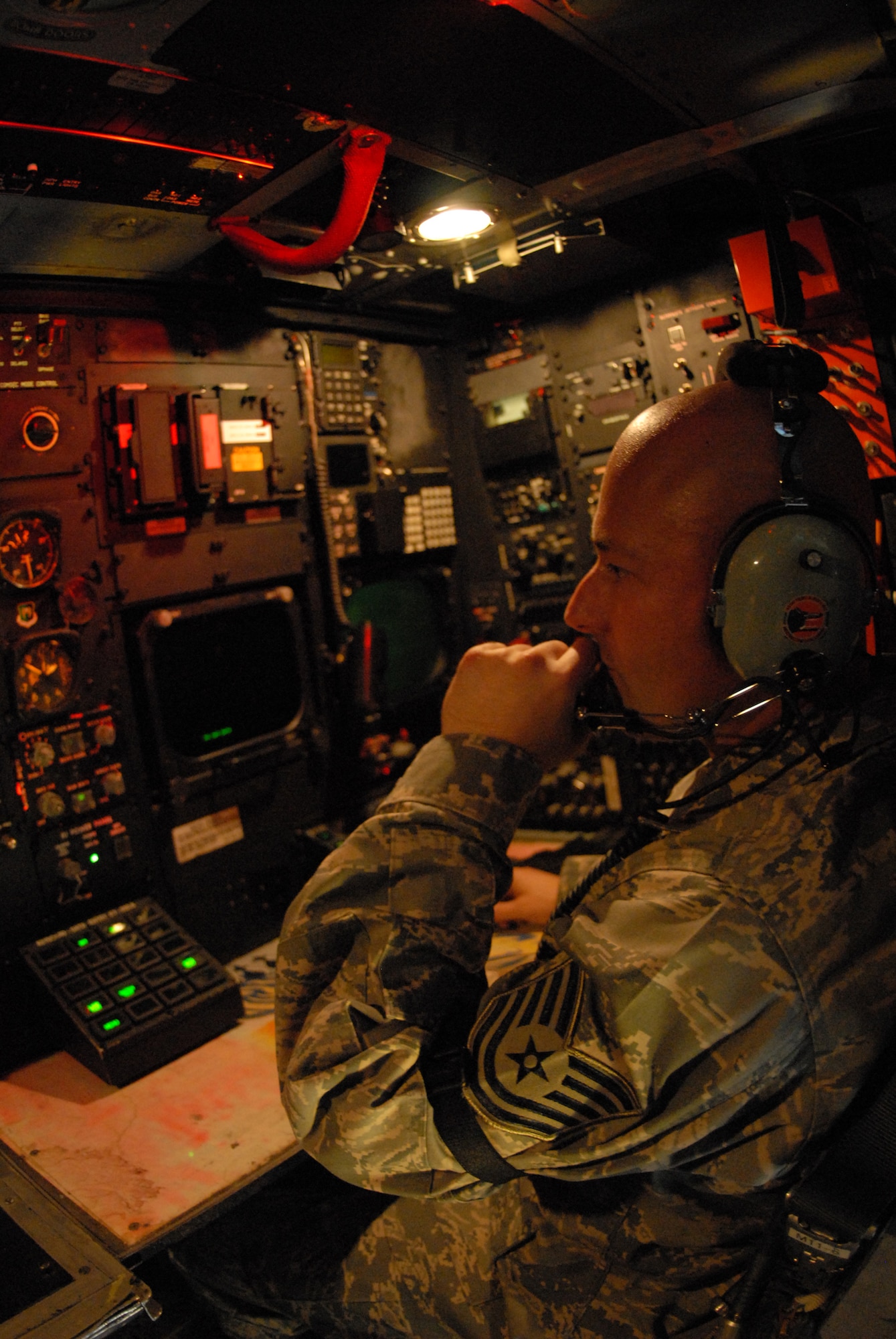 Tech Sgt. Pete Desjardins, 49th Test and Evaluation Squadron at Nellis Air Force Base, Nev., talks with the instrumentation team at the Utah Test and Training Range from inside the B-52 at Minot Air Force Base, N.D. The teams are verifying the aircraft and weapon are communicating and the equipment can operate on battery power. (U.S. Air Force photo/Staff Sgt. Samuel King Jr. 