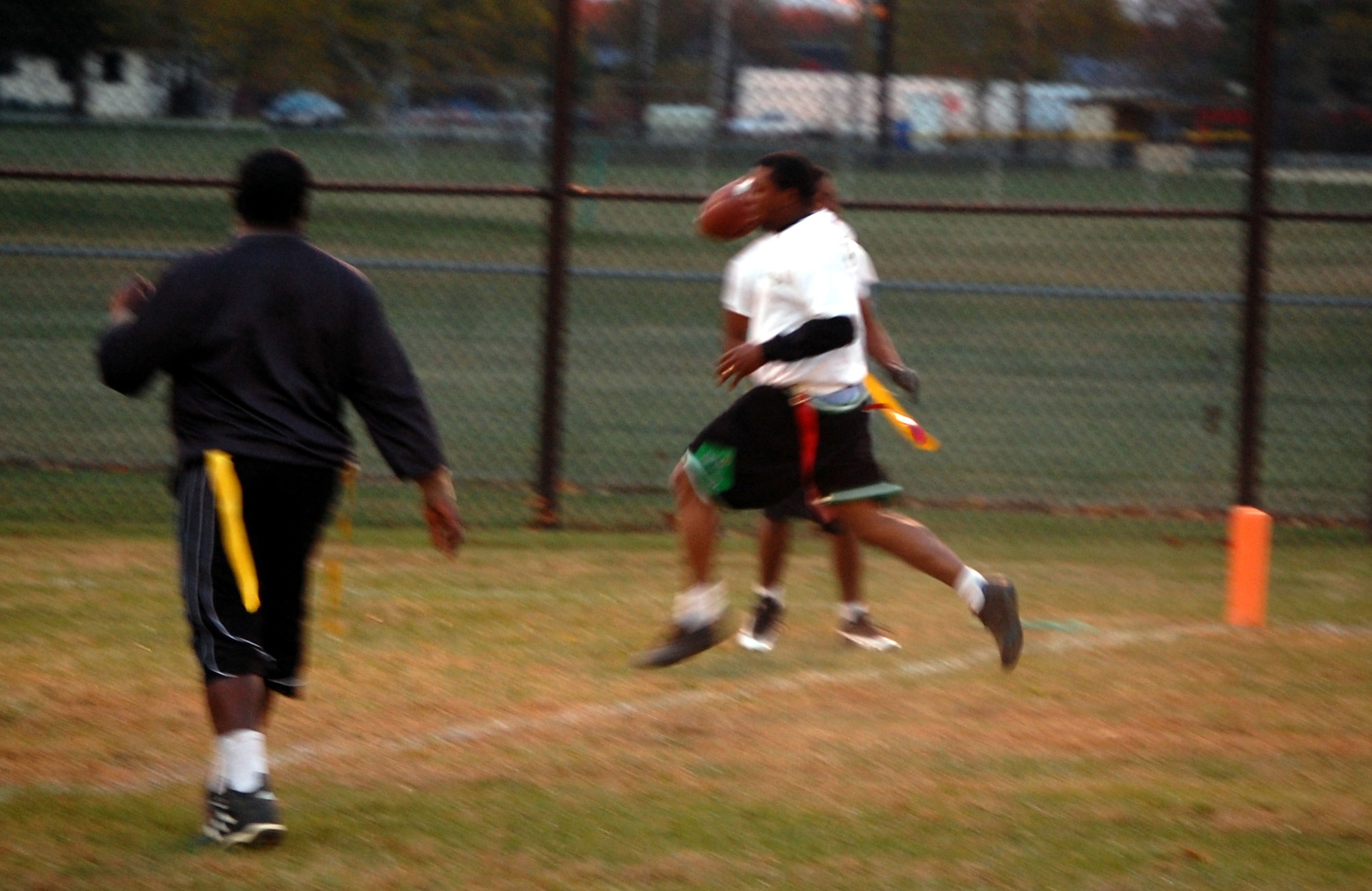 Quarterback Cecil Evans from the U.S. Air Force Expeditionary Center's "Screaming Eagles" intramural flag football team crosses the goal line for the go-ahead score during football action against the 305th Services Squadron on McGuire Air Force Base, N.J., Oct. 22, 2008.  USAF EC defeated McGuire Services 12-6 to improve to 9-3 on the season.  (U.S. Air Force Photo/Tech. Sgt. Scott T. Sturkol)