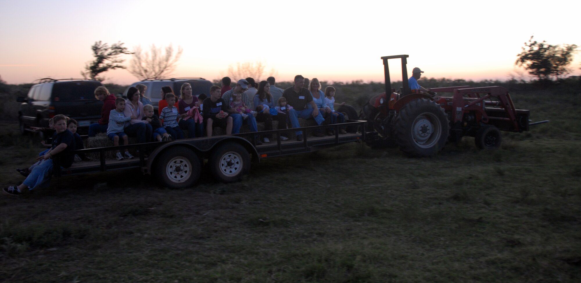 ALTUS AIR FORCE BASE, Okla. – The Altus Chamber of Commerce Committee of 100 hosted 75 Altus Air Force Base newly assigned airmen, deployment returnees and family members to a cowboy meal, hayride and horseback riding Oct. 20.  The quarterly newcomers event is organized by local businesses and was held at Lucas Farms. (U.S. Air Force photo/Senior Airman Jennifer L. Flores)
