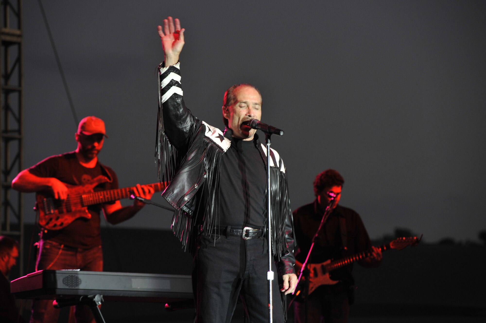 Lee Greenwood and the Band of the Air Force Reserve performed a free outdoor concert in front of the Museum of Aviation Oct. 18 for the grand opening of the new World War II hangar. U. S. Air Force photo by Claude Lazzara