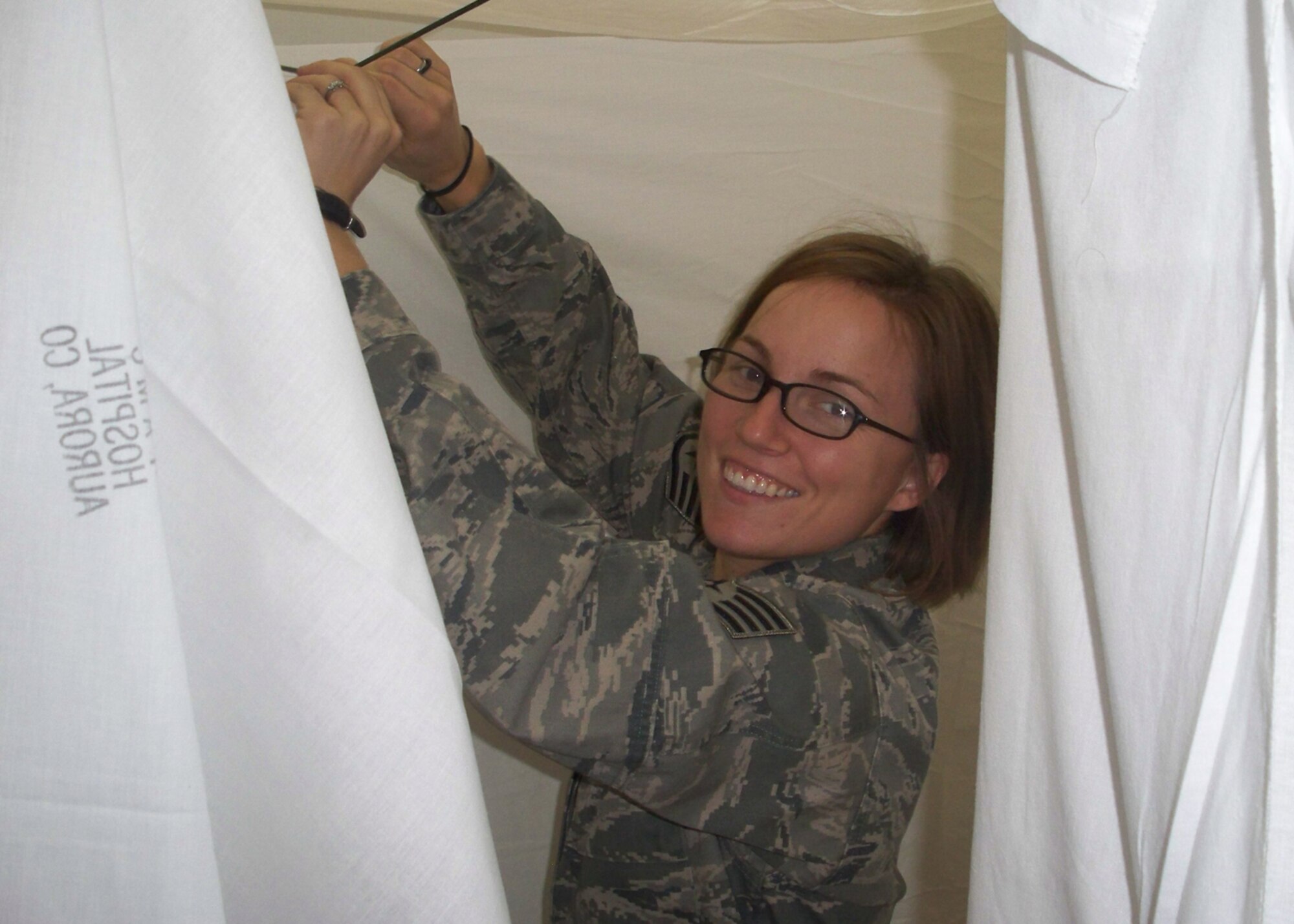 WARRIOR OF THE WEEK -- Staff Sgt. Elizabeth Foley, a housing manager for unaccompanied members from the 460th Civil Engineer Squadron, helps set up the 460th CES Slaughter House -- the CES's version of a haunted house. Sergeant Foley is Team Buckley's Warrior of the Week for Oct. 24 - 30. (Courtesy photo)