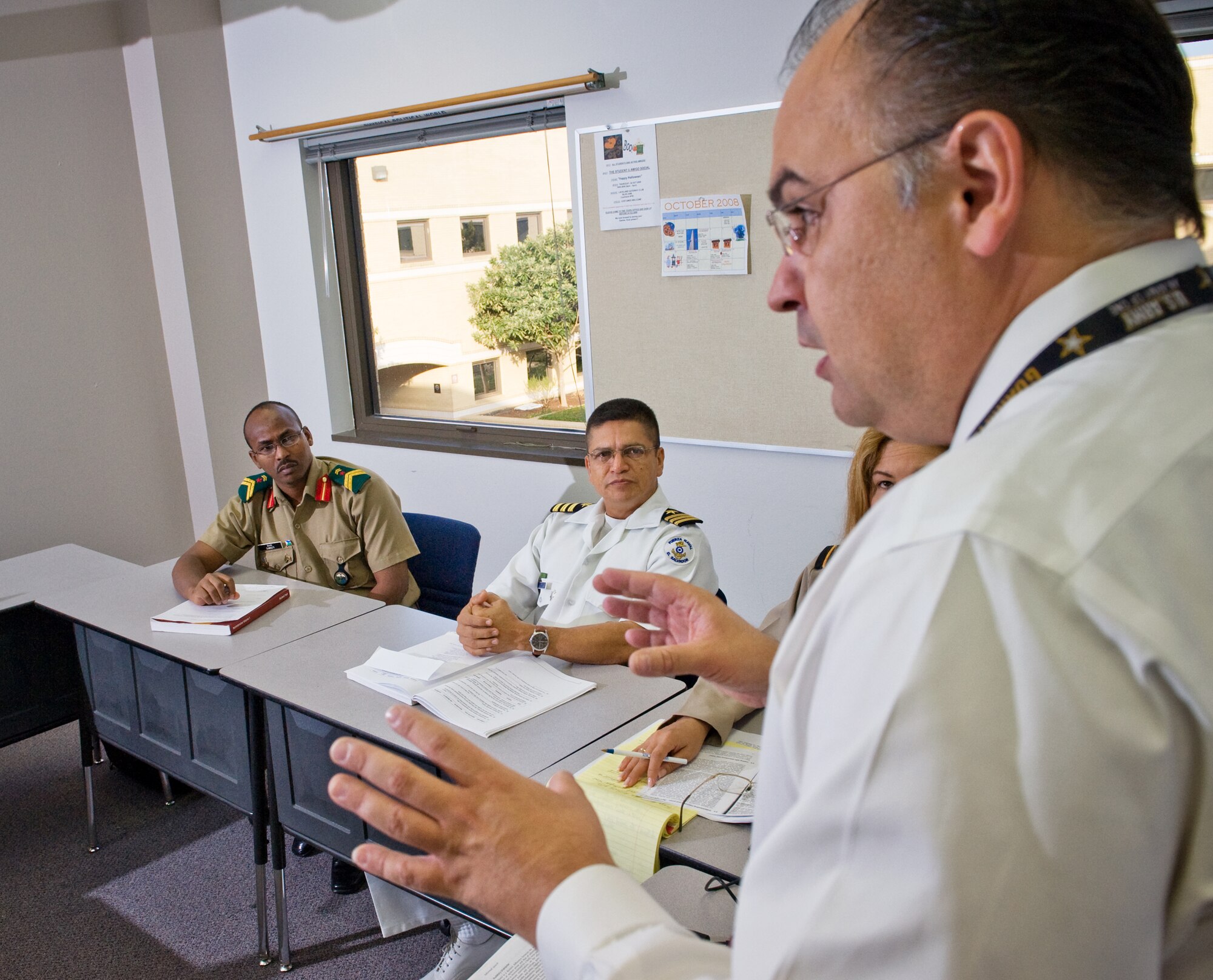 Michael Sheridan discusses the elements of listener fatigue during the American English Language Instructor Course Oct. 22 at the Defense Language Institute, Lackland Air Force Base, Texas.  Mr. Sheridan is an English Instructor in the Instructor Development Branch. (U.S. Air Force photo/Lance Cheung)