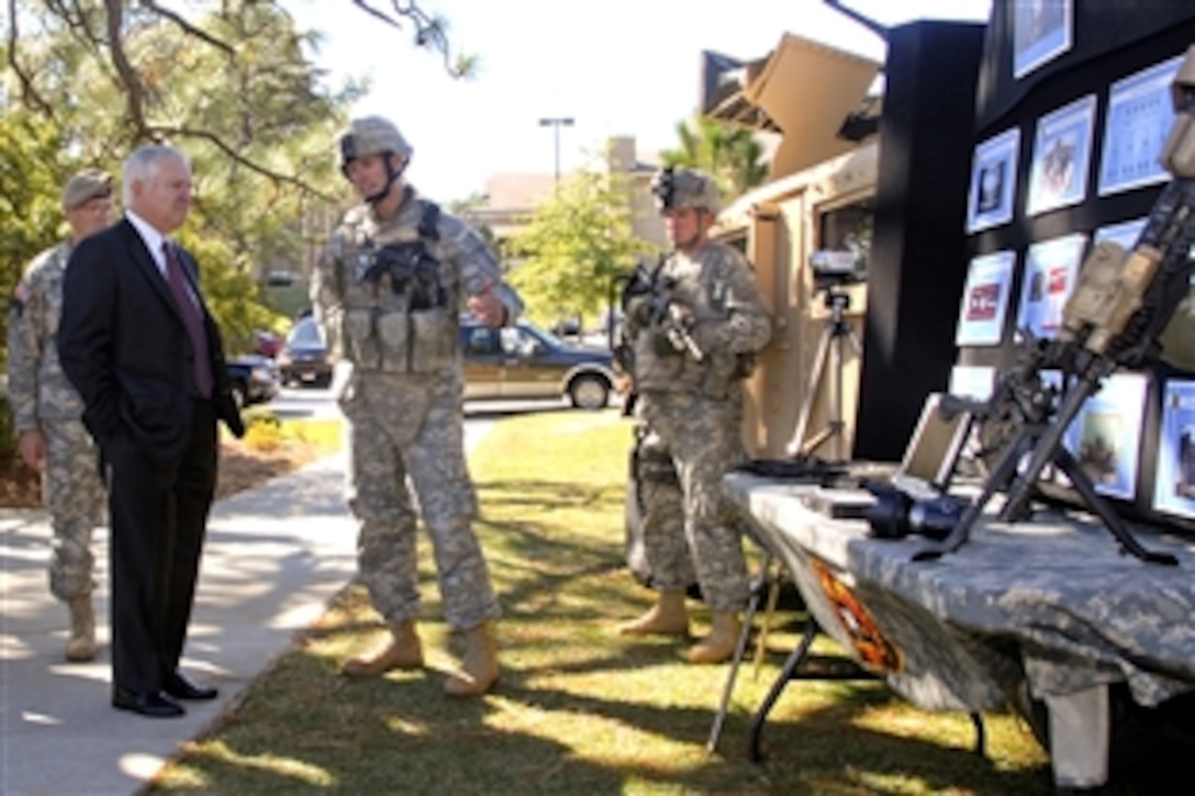 Defense Secretary Robert M. Gates speaks with soldiers from the 4th Psychological Operations Group (Airborne) during a visit to Fort Bragg, N.C., Oct. 23, 2008. The group is the U.S. Army's only active-duty psychological operations unit. Its main task is providing PSYOPS support to Army Special Operations Forces. 