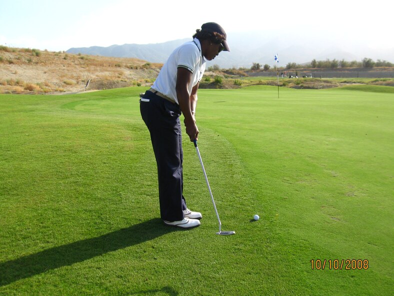 Lt. Col. Scipiaruth Kendall takes her putt.  SPECIAL CONTEST WINNERS: Putting  Contest Rick Mayer; Ladies Closest to the Pin Karen Krause; Mens Closest to the Pin Rex Hinesly; Ladies Longest Drive Pat Lutz; Mens Longest Drive Keith Ward; “Bringing up the Rear” P.J. Huck, Patsy Lutz, Karen Smith, Sylvia Frausto (U.S. Air Force photo)