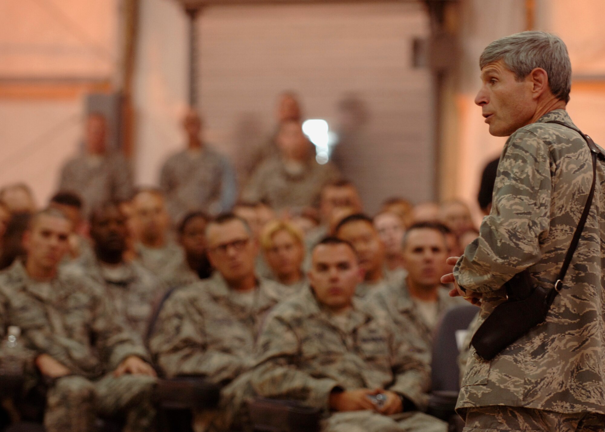 Air Force Chief of Staff Gen. Norton Schwartz speaks to Airmen from the 447th Air Expeditionary Group at Sather Air Base, Iraq, Oct. 24. General Schwartz spoke to Airmen about career field reorganization, deployment training and the on-going operations in Iraq. This is the CSAF's first trip to Iraq since assuming his current position as the Air Force chief of staff. (U.S. Air Force photo/Staff Sgt. Paul Villanueva II)