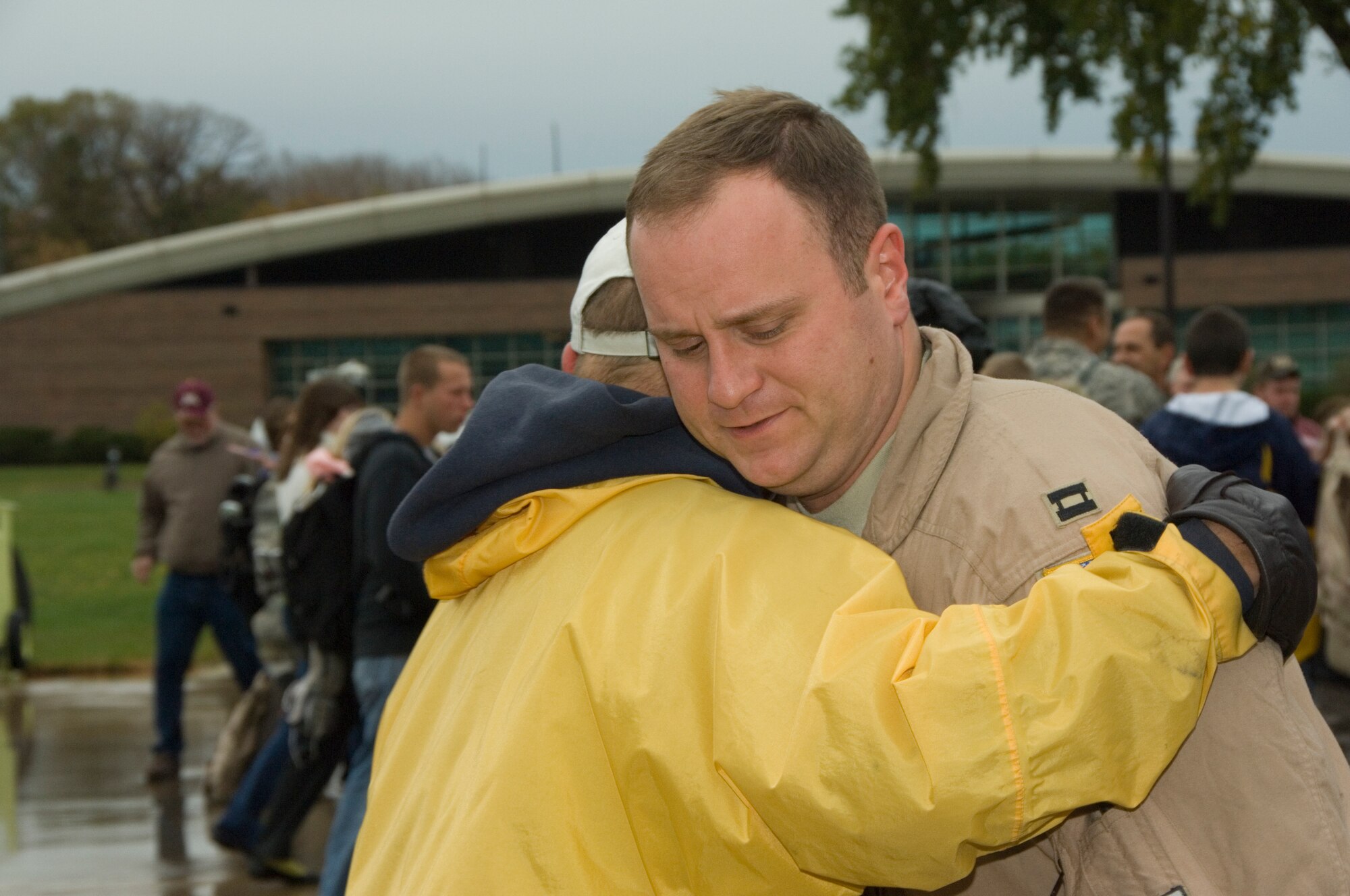 Captain Tom Hoffer, a C-130 navigator with the 109th Airlift Squadron, gets a big hug from his dad as he steps off the aircraft returning from Afghanistan on Oct. 22, 2008.