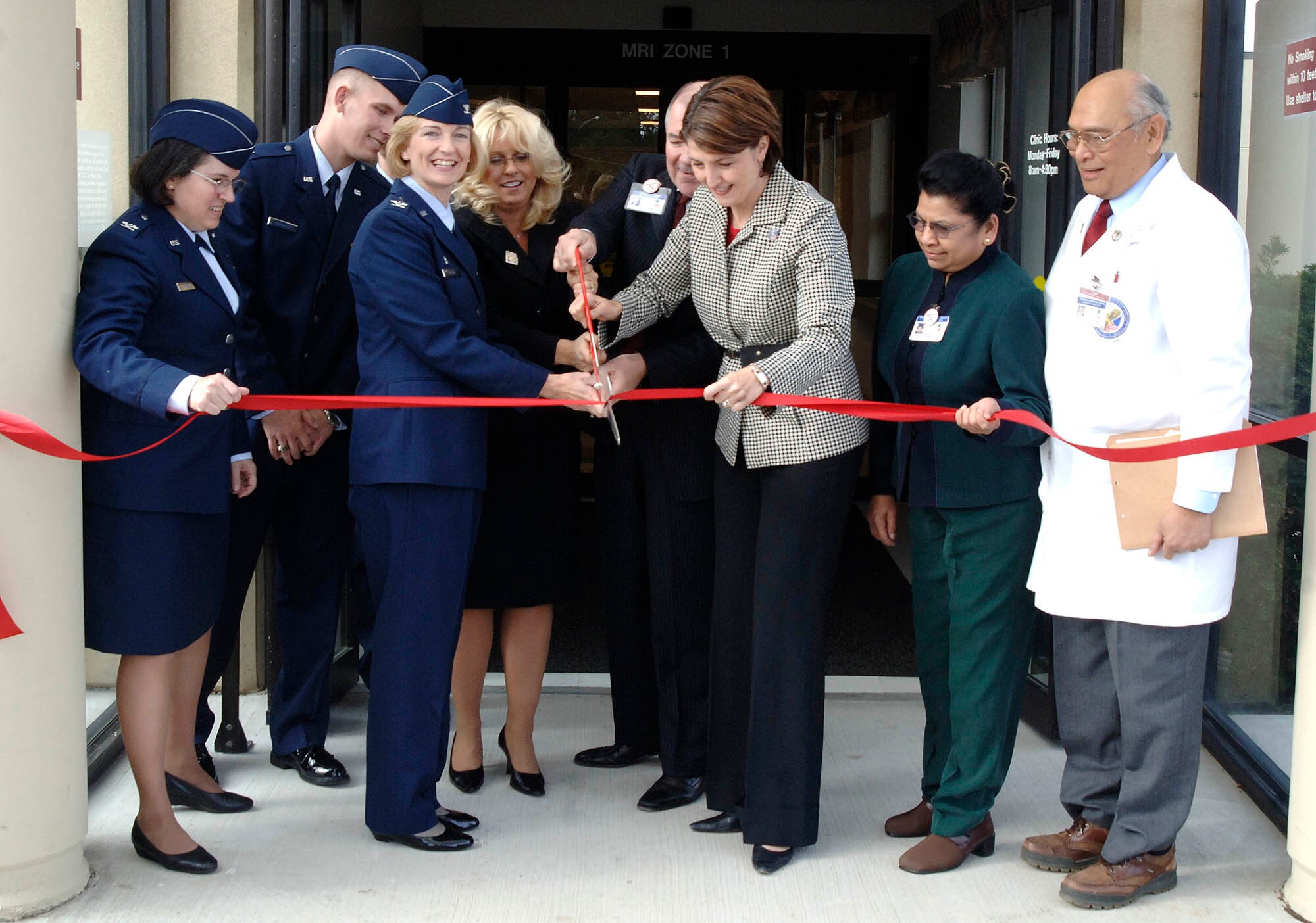 SPOKANE, Wash. – Washington Congresswoman Cathy McMorris-Rodgers and Col. Anne Sproul, 92nd   Medical Group commander, cut a ceremonial ribbon at the Veteran Affairs Hospital Oct. 17. The event culminated the grand opening of the magnetic resonance imagining section of the hospital. (U.S. Air Force photo / Staff Sgt. JT May III)