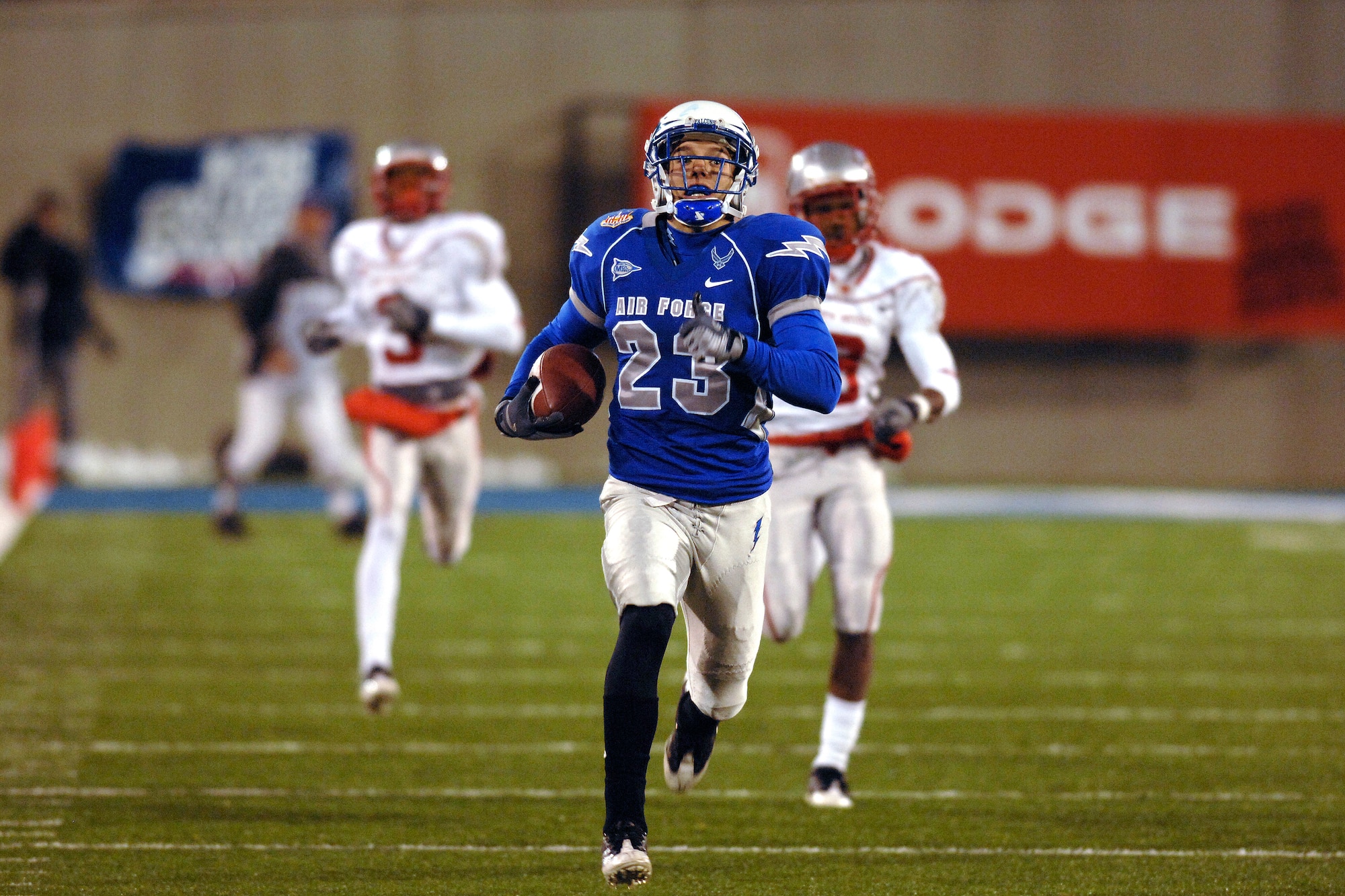 U.S. Air Force Academy Falcon free safety Aaron Kirchoff rambles downfield during his 96-yard return of a fumble recovery for a game-changing touchdown against the University of New Mexico. The UNM Lobos scored 70 points last week against San Diego State, but were limited to only 10 points, which came off of early turnovers deep in Falcons territory. Despite the turnovers, the Falcons defense limited the New Mexico offense to 303 yards for a 23-10 win Oct. 23 at Falcon Stadium in Colorado. (U.S. Air Force photo/Dennis Rogers)