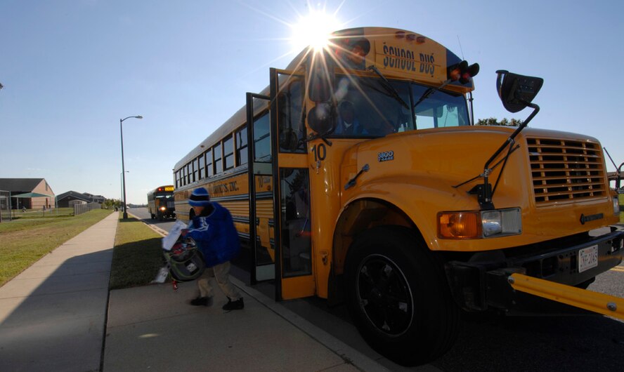 Jalen Morrow exits the bus Oct. 22 on Bolling. The national school bus safety campaign is Oct. 19-25. The campaign’s goal is to promote bus safety. The 11th Wing Safety Office is helping to educate Bolling adults and children on the safety and precautionary measures for students riding school buses. For questions about safety, including school bus safety, contact the 11 Wing Safety Office at (202) 404 6390 (U.S. Air Force photo by Senior Airman Tim Chacon)