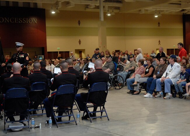 The United States Marine Corps Band from Parris Island, S.C., play during the closing ceremony for the Moving Wall display at the North Charleston Performing Arts Center in North Charleston, S.C., Oct. 18. Airmen, Sailors, Soldiers, Marines and Coast Guardsmen stood watch 24 hours a day from Oct. 16 to 20 at the wall which is a half-size replica of the Vietnam Veterans National Memorial, The Wall, located in Washington, D.C. (U.S. Air Force photo/Airman 1st Class Katie Gieratz)