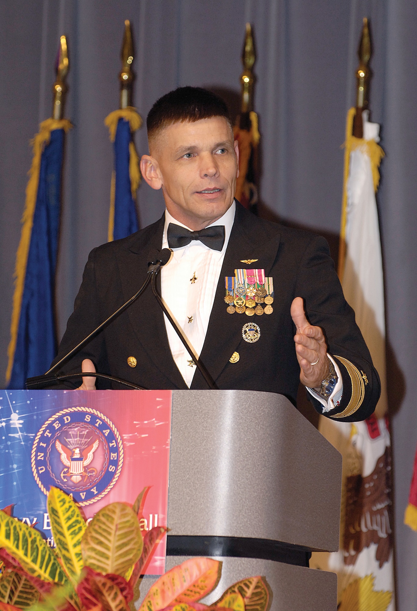 Rear Adm. Doug McClain, an Oklahoma native and director of Global Operations (J3) at U.S. Strategic Command, a Sailor who has served in several operations, earned numerous decorations and has flown more than 6,500 hours in carrier jet aircraft, was the featured speaker during this year’s Navy Ball.  He thanked the thousands of Sailors deployed around the globe and the families who support their Sailors at home or abroad. “A Sailor will never let you down,” he stated firmly. (Air Force photo/Margo Wright)