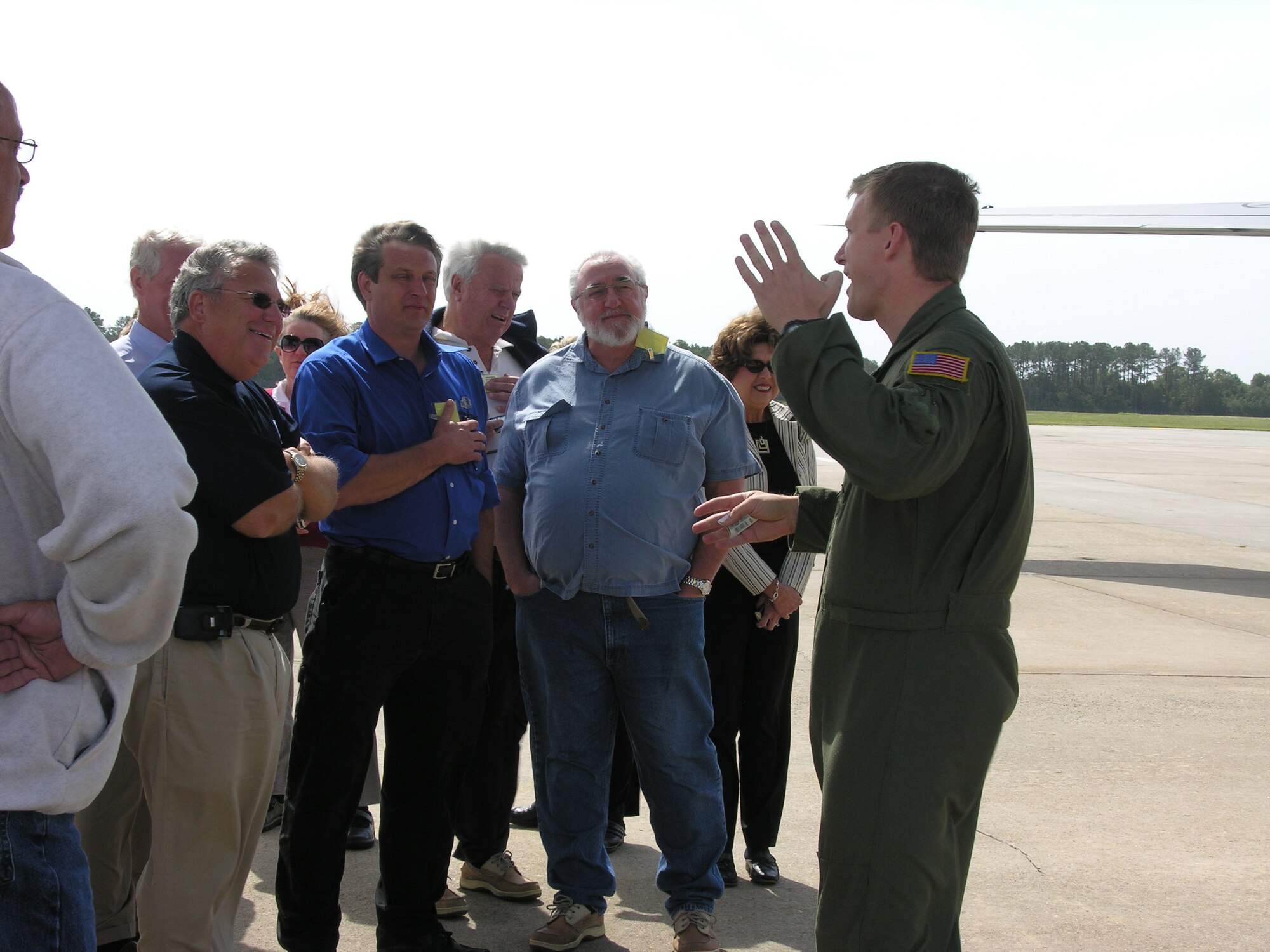 SEYMOUR JOHNSON AIR FORCE BASE, N.C. -- Staff Sgt. Jeremy Reynolds, a boom operator with the 77th Air Refueling Squadron, explains how a refueling mission works aboard a KC-135 Stratotanker to a group of statewide civic leaders. The 916th Air Refueling Wing hosts two civic leader flights a year to educate community and civic leaders on the roles and mission of the Air Force Reserve.