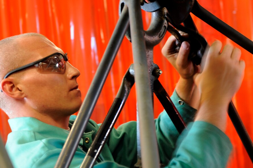 BARKSDALE AIR FORCE BASE, La. - Airman 1st Class Joshua Clark a metals technologist from 2d Maintenance Squadron prepares to weld a crack in a B-5 stand at the fabrication flight hanger located at Barksdale Air Force Base, La., Oct. 1. (U.S. Air Force photo by Airman 1st Class Joanna M. Kresge)