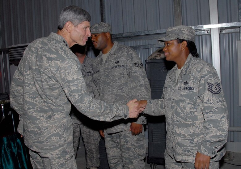 SOUTHWEST ASIA -- Chief of Staff of the Air Force, Gen. Norton Schwartz, thanks Tech. Sgt. Toni Beaty, a dining facility manager for the 380th Expeditionary Services Squadron, after a senior leader dinner here Oct. 22. (U.S. Air Force photo by Tech. Sgt. Denise Johnson/released)