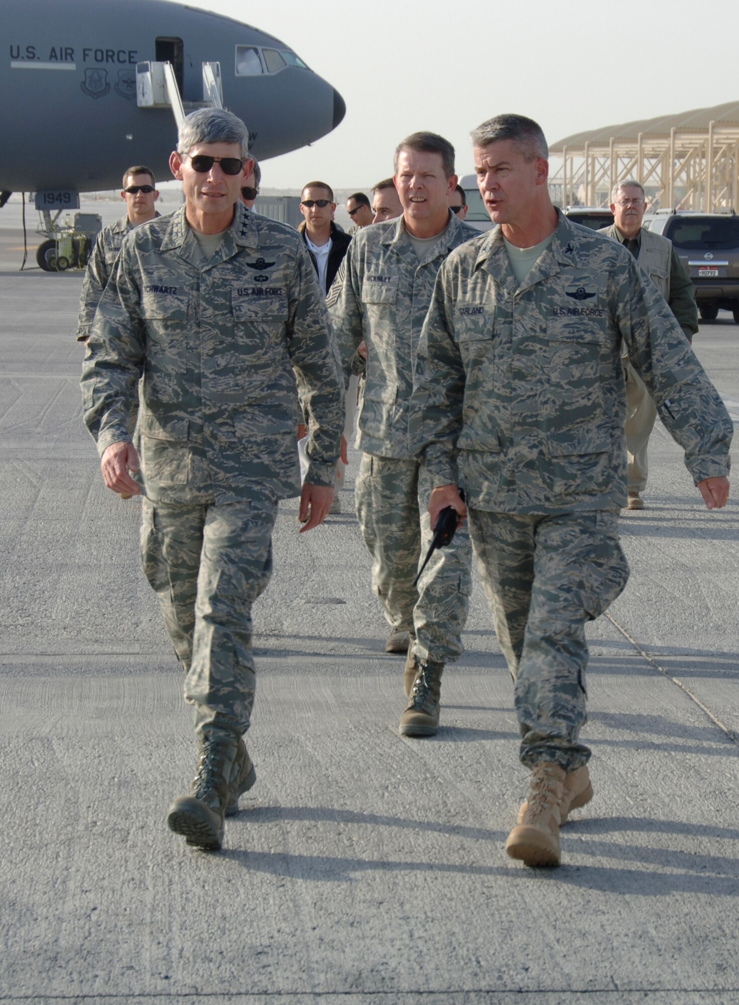 SOUTHWEST ASIA -- Chief of Staff of the Air Force Gen. Norton Schwartz speaks to the 380th Air Expeditionary Operations Group Commander Col. Kyle Garland here Oct. 22. General Schwartz visited the 380th Air Expeditionary Wing to gain a better understanding of the infrastructure and capabilities of one the smaller but most diverse bases in the Area of Responsibility. (U.S. Air Force photo/Tech. Sgt. Christopher A. Campbell)(released)