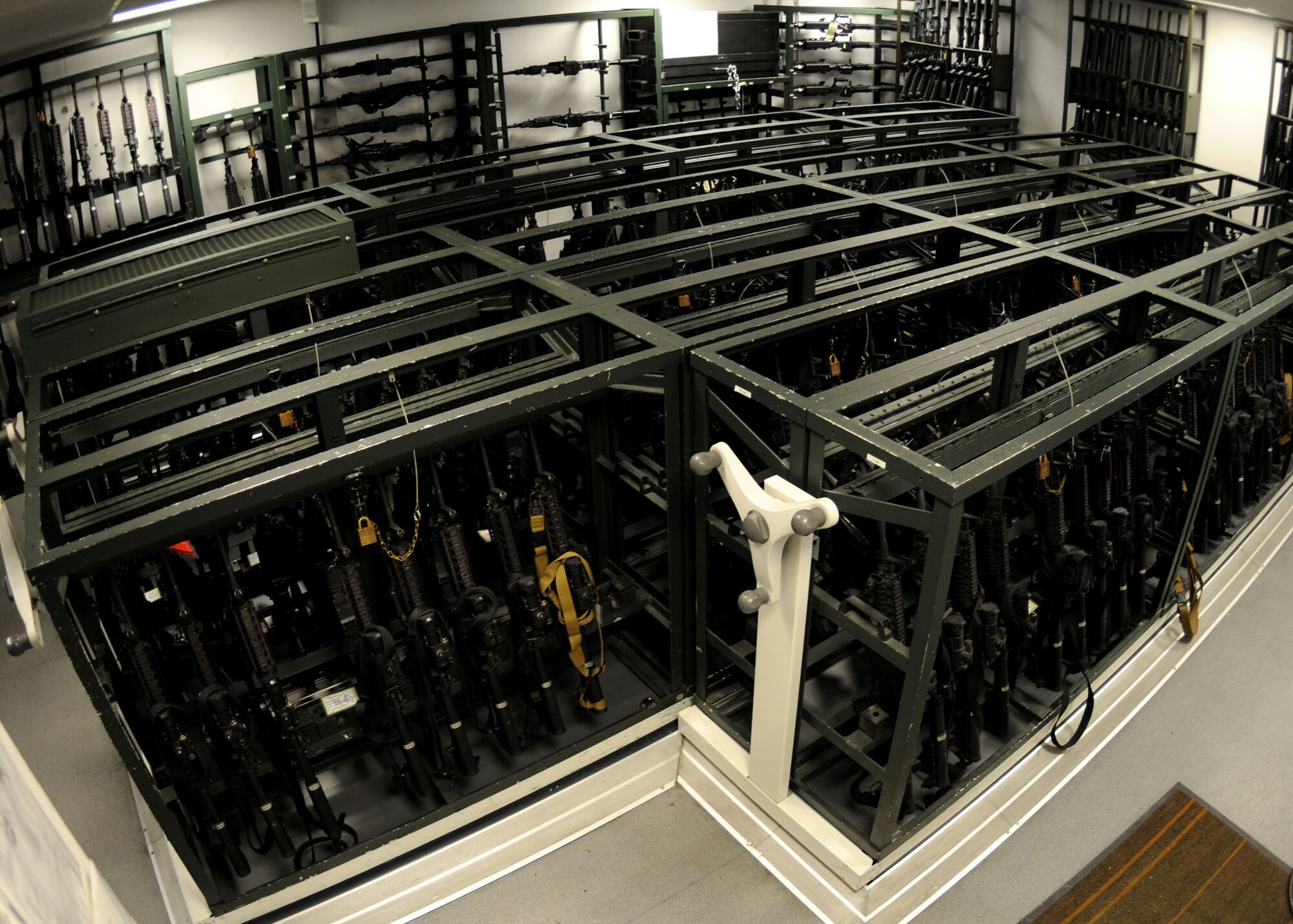 The 100th Security Forces Squadron armory section keeps a wide variety of firearms safely secured at RAF Mildenhall, England Oct. 21, 2008. All military members who own firearms are required to keep them stored at the armory.  Additionally they issue and deploy government weapons to military members whose job requires them, also performing routine inspections and basic maintenance. (U.S. Air Force photo by Staff Sgt. Jerry Fleshman)