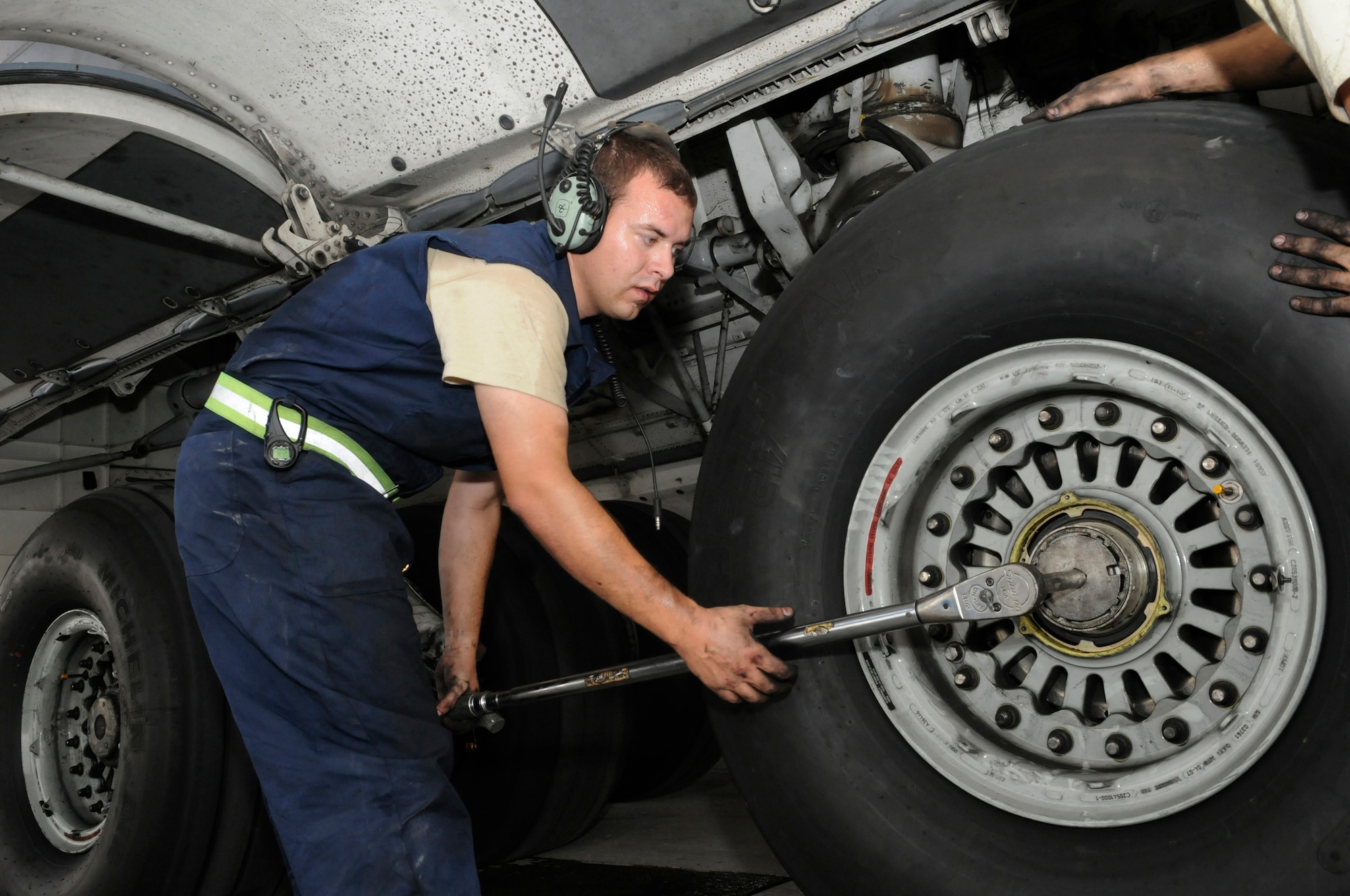 Staff Sgt. Branson Standridge, 8th Expeditionary Air Mobility Squadron, uses a torque wrench to secure the wheel of a C-17 Globemaster III, October 23.    The wheel is the last step in the process of completing a brake change at an undisclosed air base in Southwest Asia. The C-17 is capable of rapid strategic delivery of troops and all types of cargo to main operating bases or directly to forward bases in the Central Command area of responsibility.  Sergeant Standridge is a native of Atkins, Ark., and is deployed from Charleston Air Force Base, S.C., in support of Operations Iraqi and Enduring Freedom and Joint Task Force-Horn of Africa.  (U.S. Air Force photo by Tech. Sgt. Michael Boquette/Released)