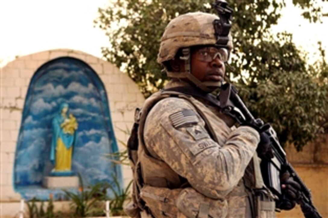 U.S. Army Sgt. George Swain conducts a patrol near a Christian shrine in Mosul, Iraq, Oct. 21, 2008. Swain and fellow soldiers of the 3rd Armor Cavalry Regiment's 3rd Squadron were assessing the situation of Christians living in the area.
