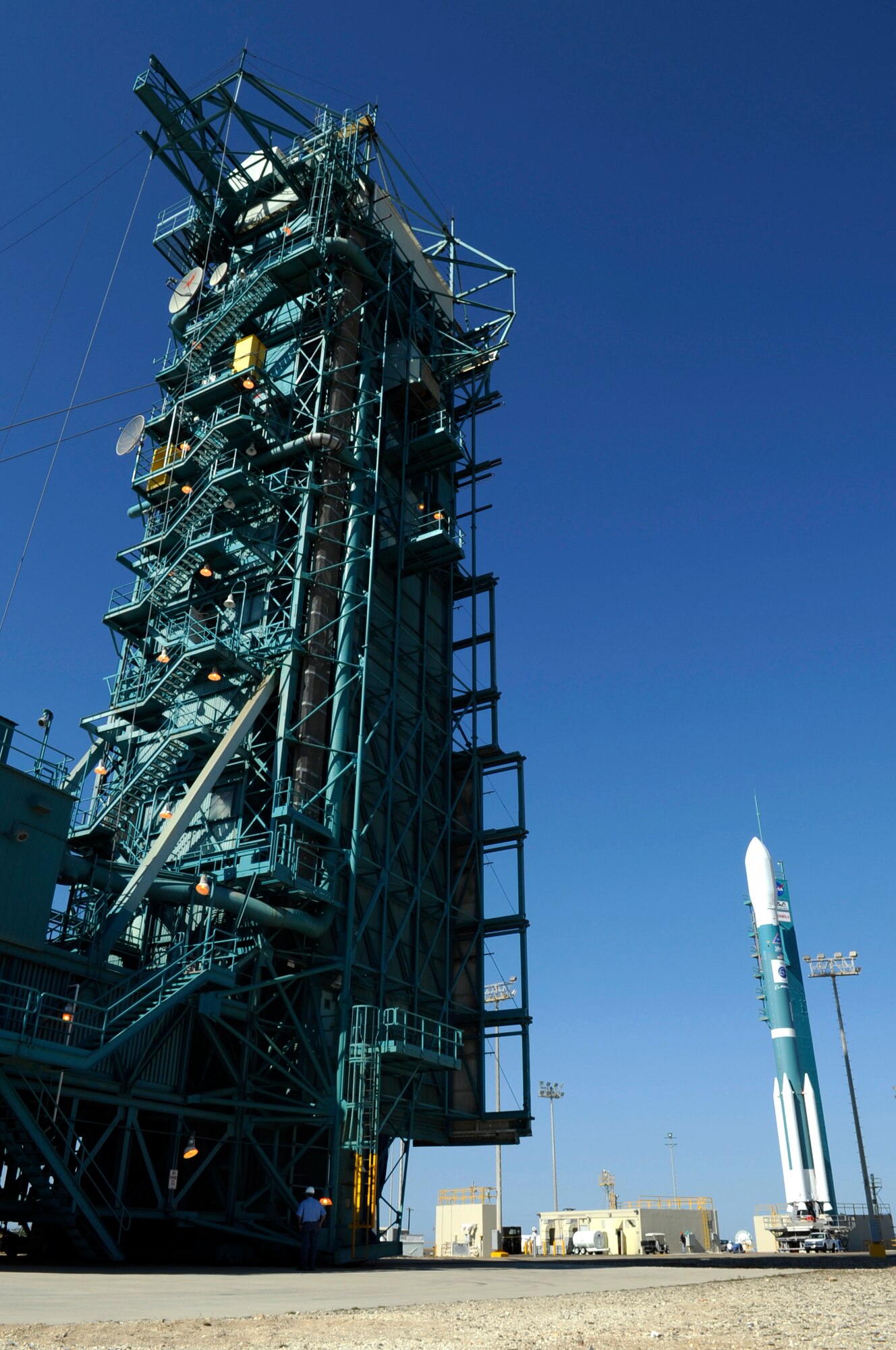 The tower rolls back exposing a Delta II rocket hours before launch Oct. 24.  Vandenberg successfully launched the Delta II rocket at 7:28 p.m.  The rocket took off from Space Launch Complex-2 carrying the Thales Alenia-Space COSMO-SkyMed 3 Satellite. (U.S. Air Force photo / Senior Airman Stephanie Longoria)
