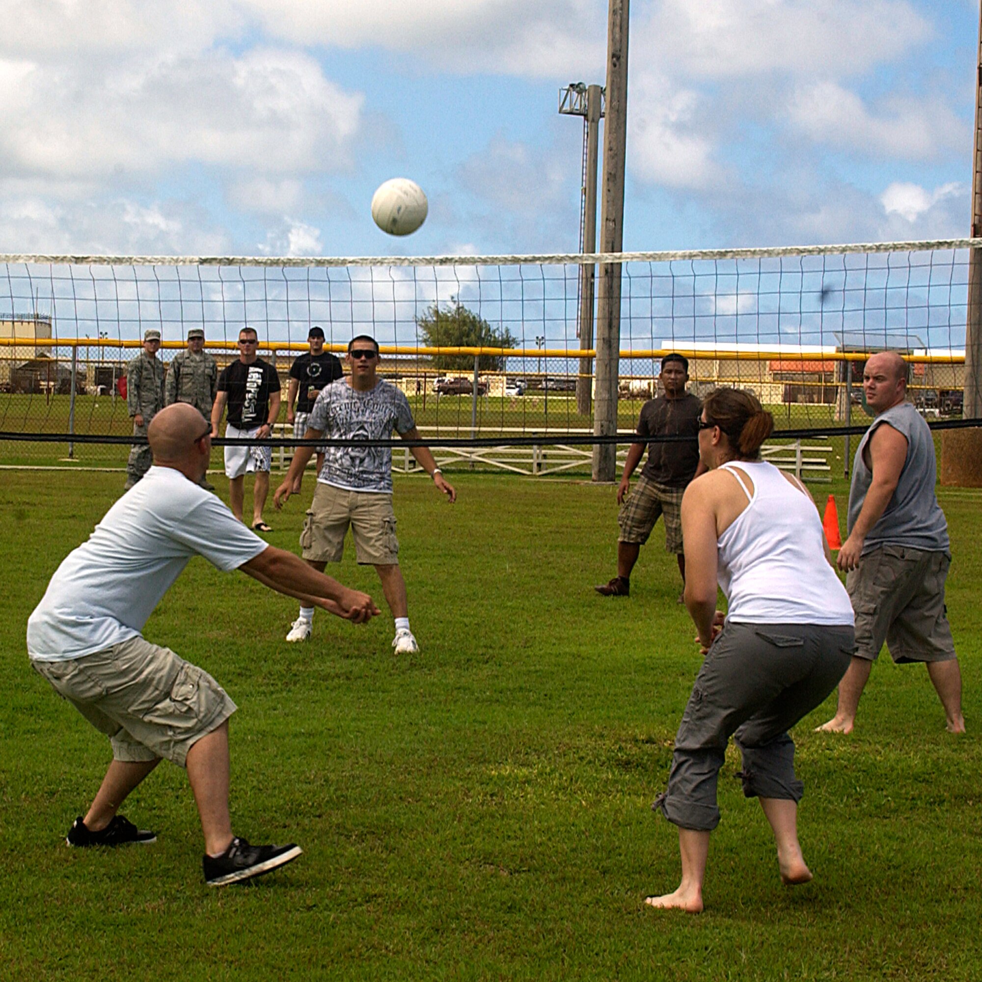 Staff Sgt. Brandon Williamson, 736th Security Forces Squadron gets ready to volley the ball across the net during a game of volleyball at the Junior Enlisted Appreciation Day event held here Oct. 24. (U.S. Air Force photo by Airman 1st Class Carissa Wolff)                                                       