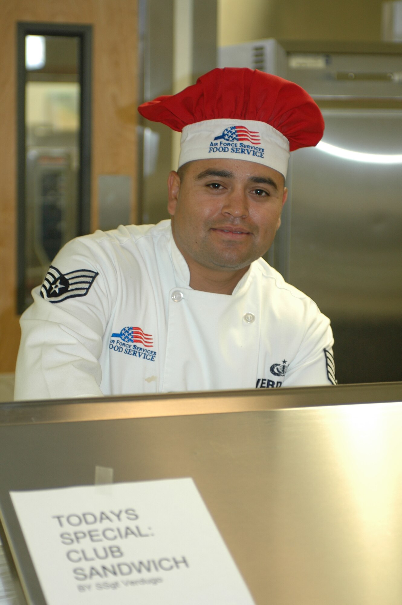 Staff Sgt. Raul Verdugo prepares a club sandwich for a unit member. (Air National Guard photo by 1st Lt. Dan Dodson)