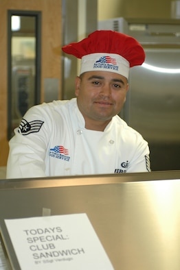 Staff Sgt. Raul Verdugo prepares a club sandwich for a unit member. (Air National Guard photo by 1st Lt. Dan Dodson)