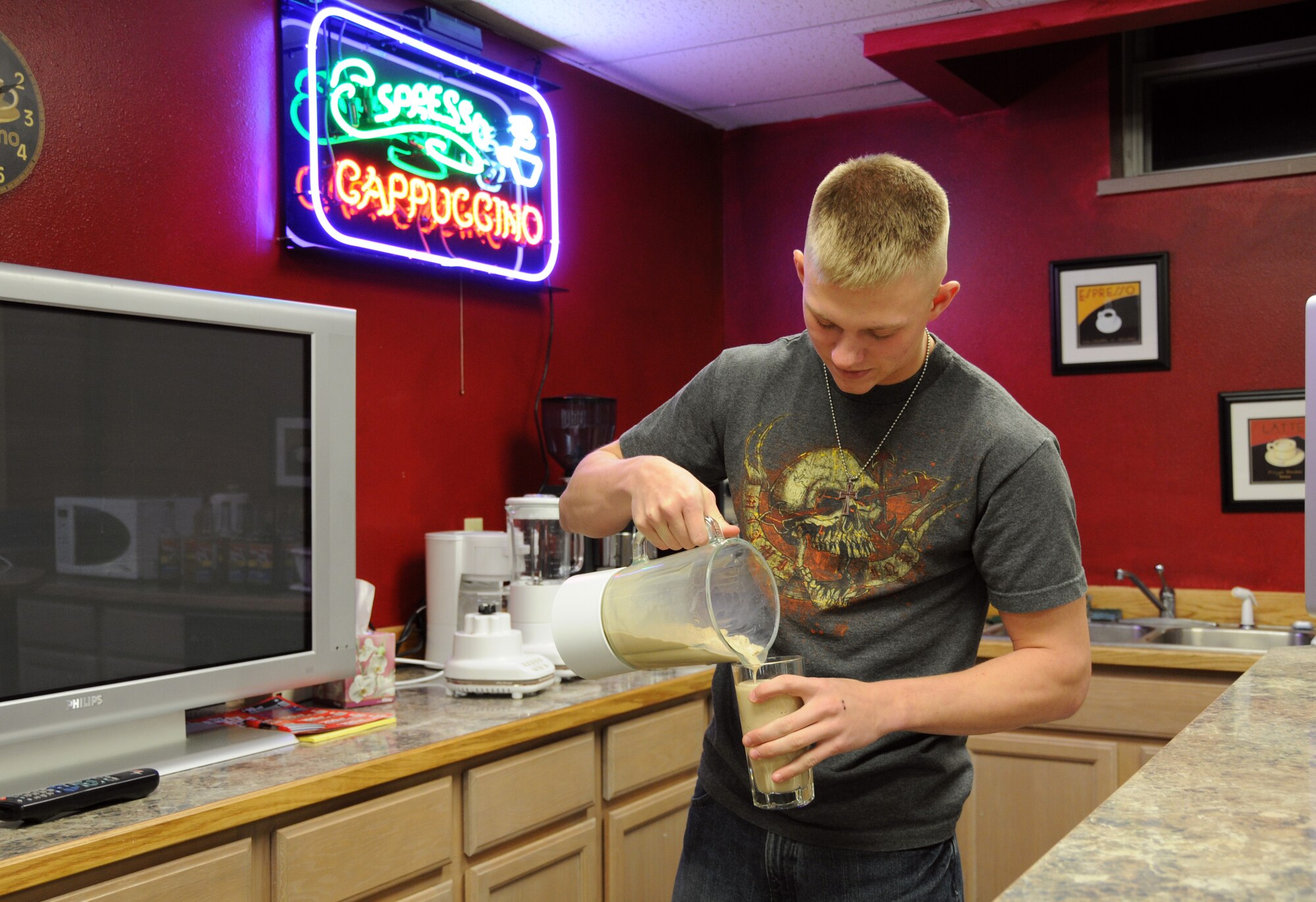 Airman 1st Class Dan Parish-Olson makes a milk shake at the North Star Cafe Oct. 25, 2008 at Eielson Air Force Base, Alaska. The cafe offers free milk shakes, cappuccinos, and canned soda to Airmen who enjoy taking advantage of the many amenities the cafe has to offer.(U.S. Air Force photo/Airman Laura Max) 