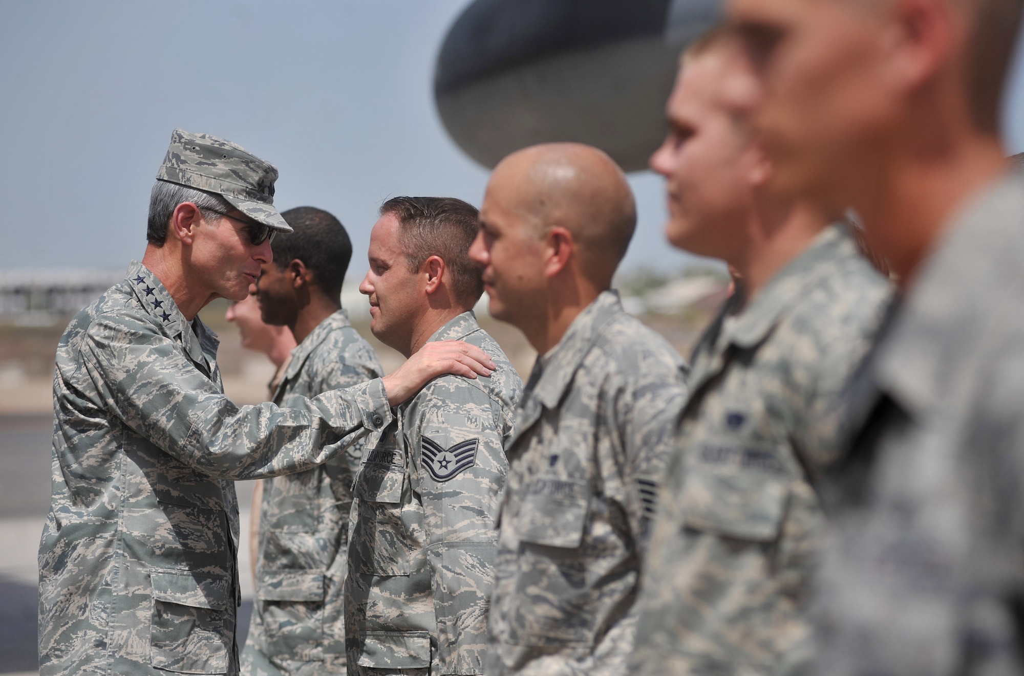 Air Force Chief of Staff Gen. Norton Schwartz speaks with Staff Sgt. Adam Moody at Camp Lemonier, Djibouti, Oct. 23. The visit marked General Schwartz's first trip to the Horn of Africa since his appointment as the Air Force chief of staff. Sergeant Moody is assigned to the 81st Expeditionary Rescue Squadron, Combined Joint Task Force-Horn of Africa. (U.S. Air Force photo/Master Sgt. Stan Parker)


